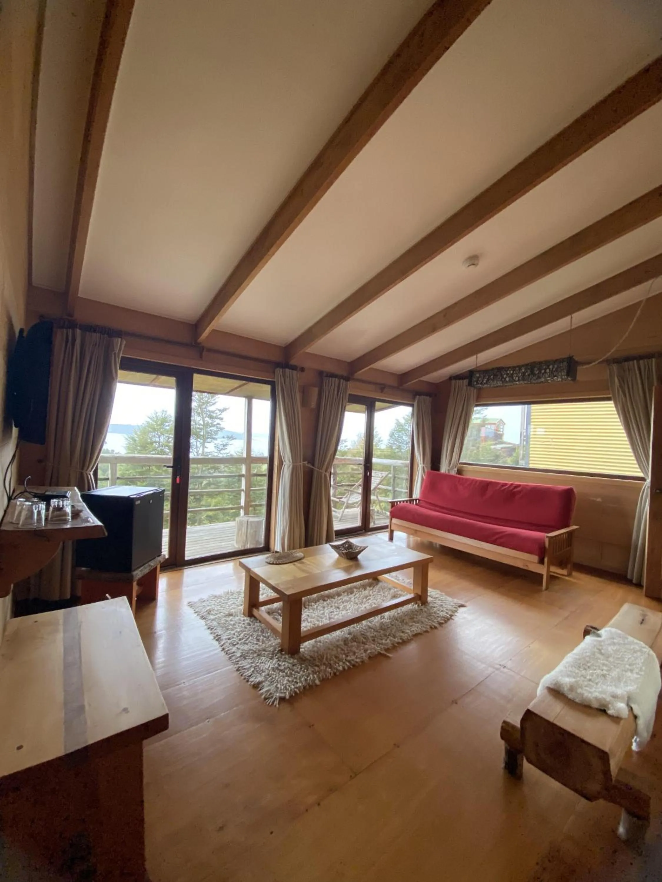 Living room, Bed in Hotel Parque Quilquico