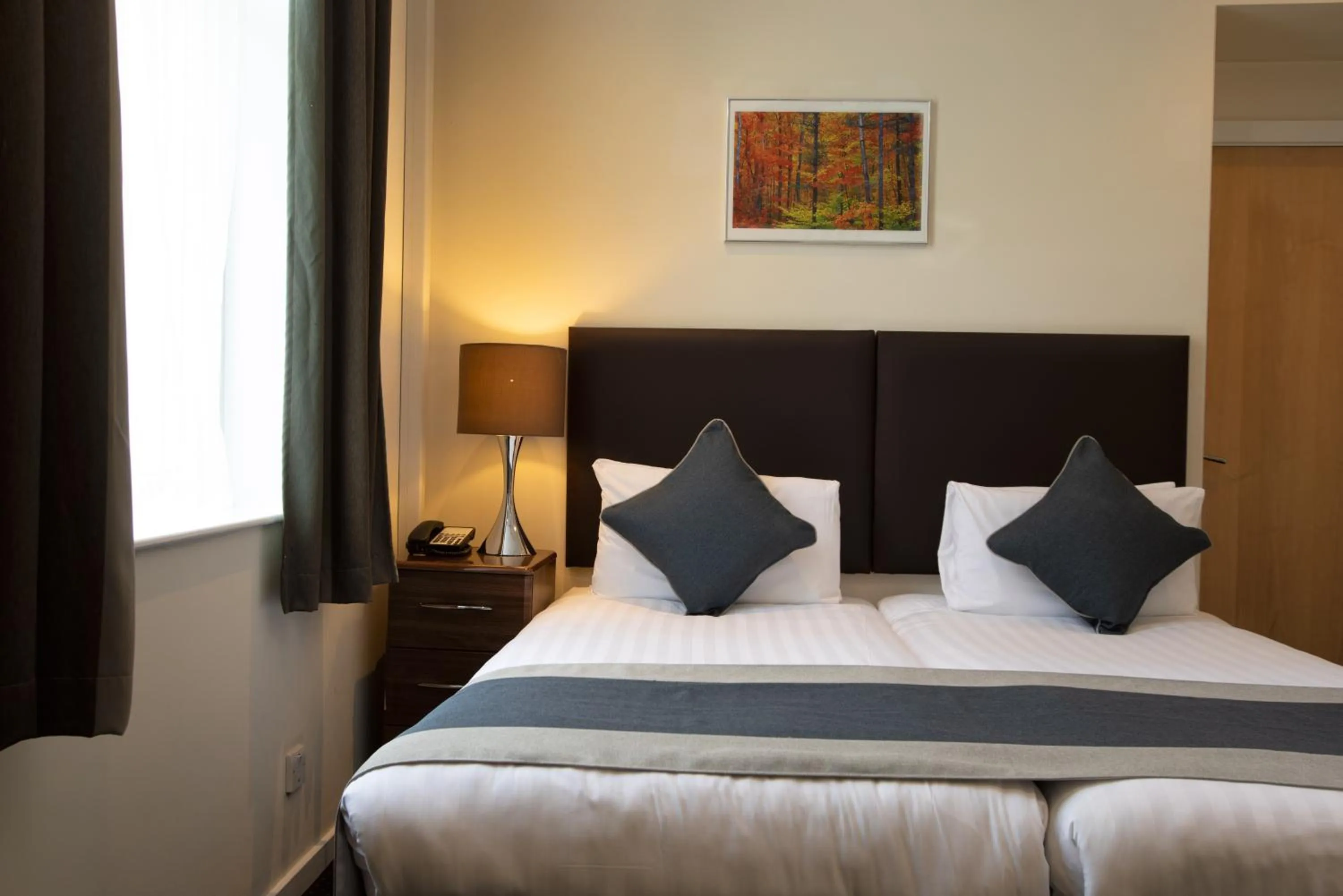 Bed in Grand Plaza Serviced Apartments