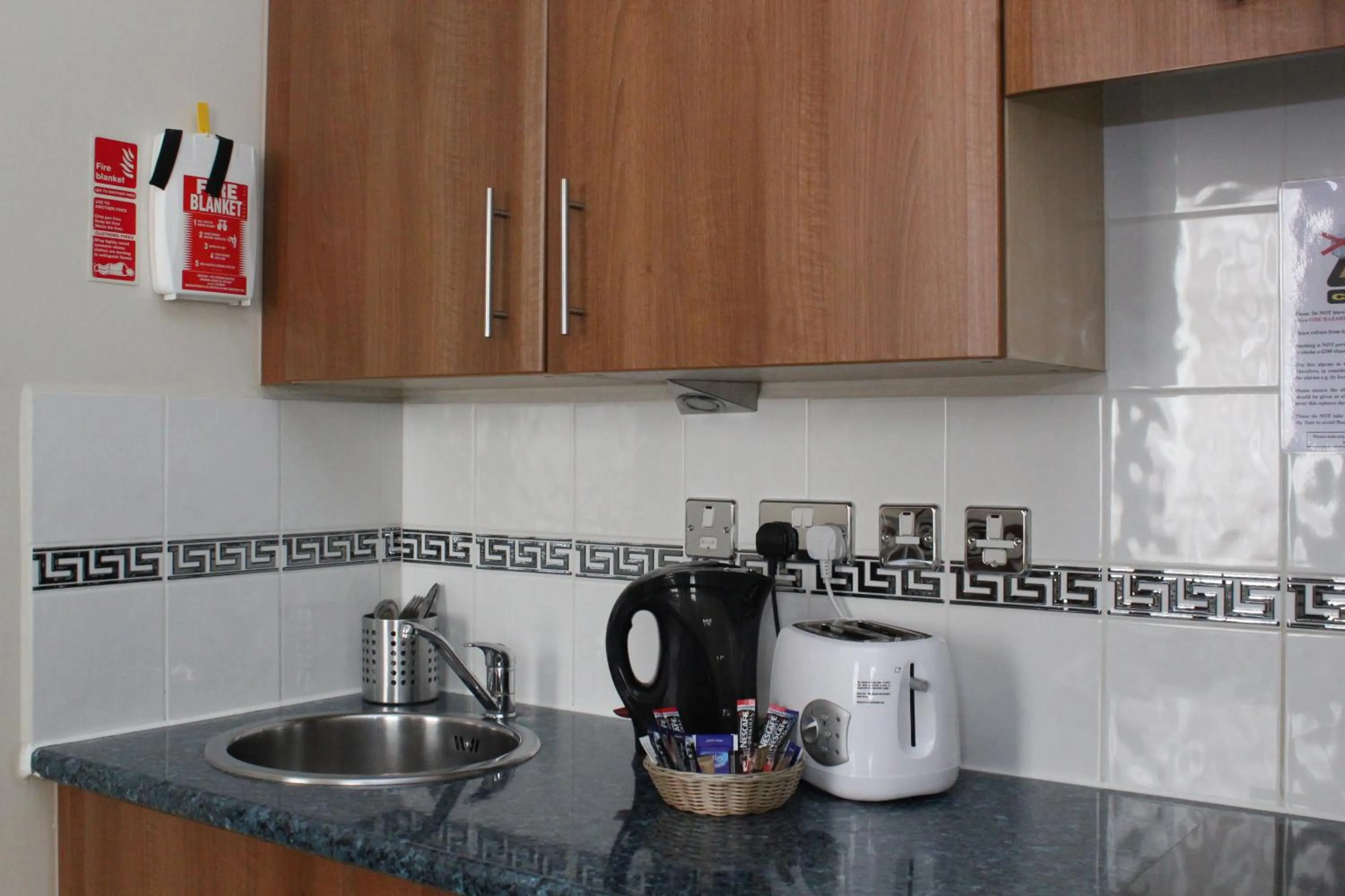 Kitchen or kitchenette in Grand Plaza Serviced Apartments