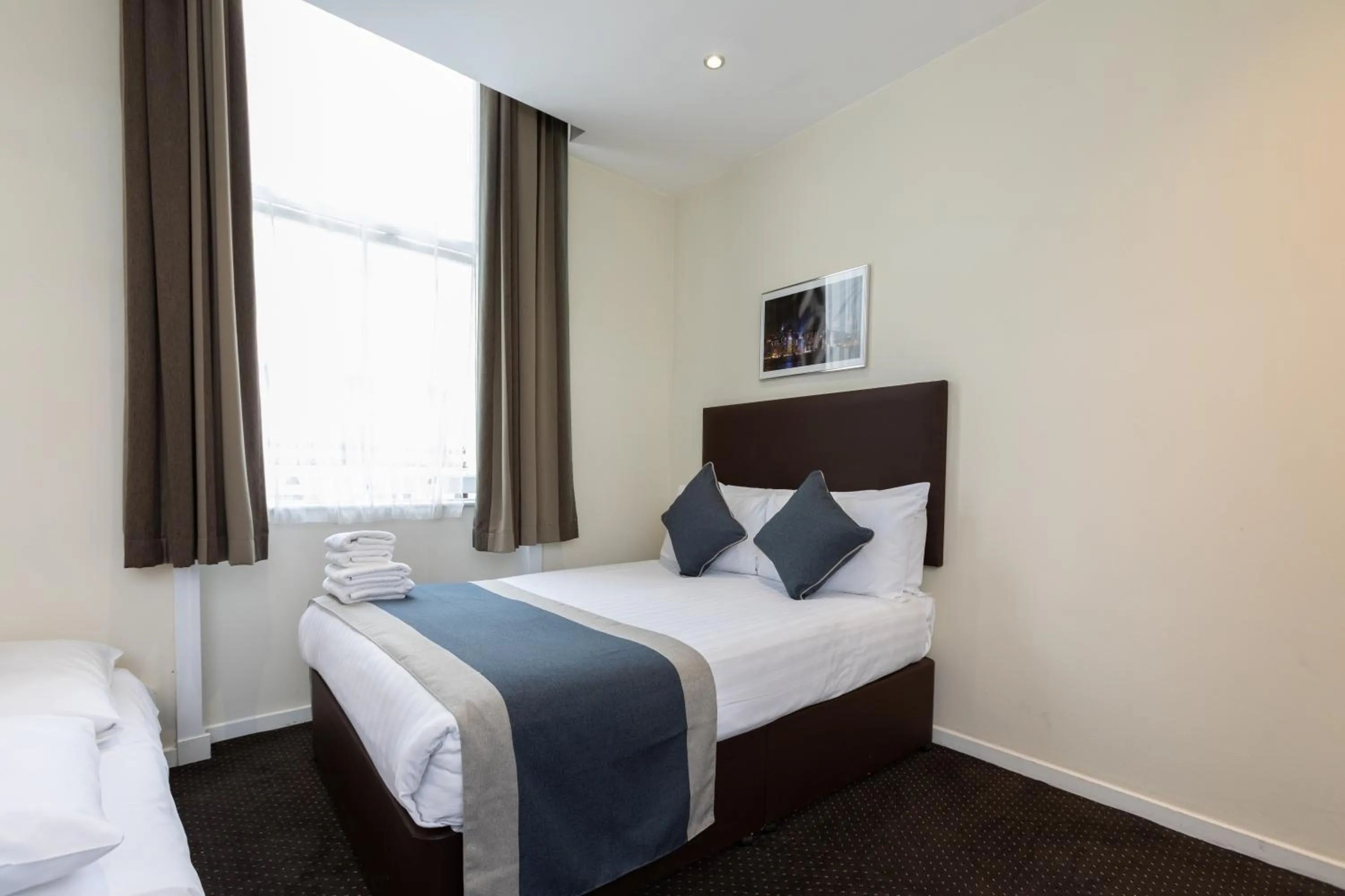 Bed in Grand Plaza Serviced Apartments