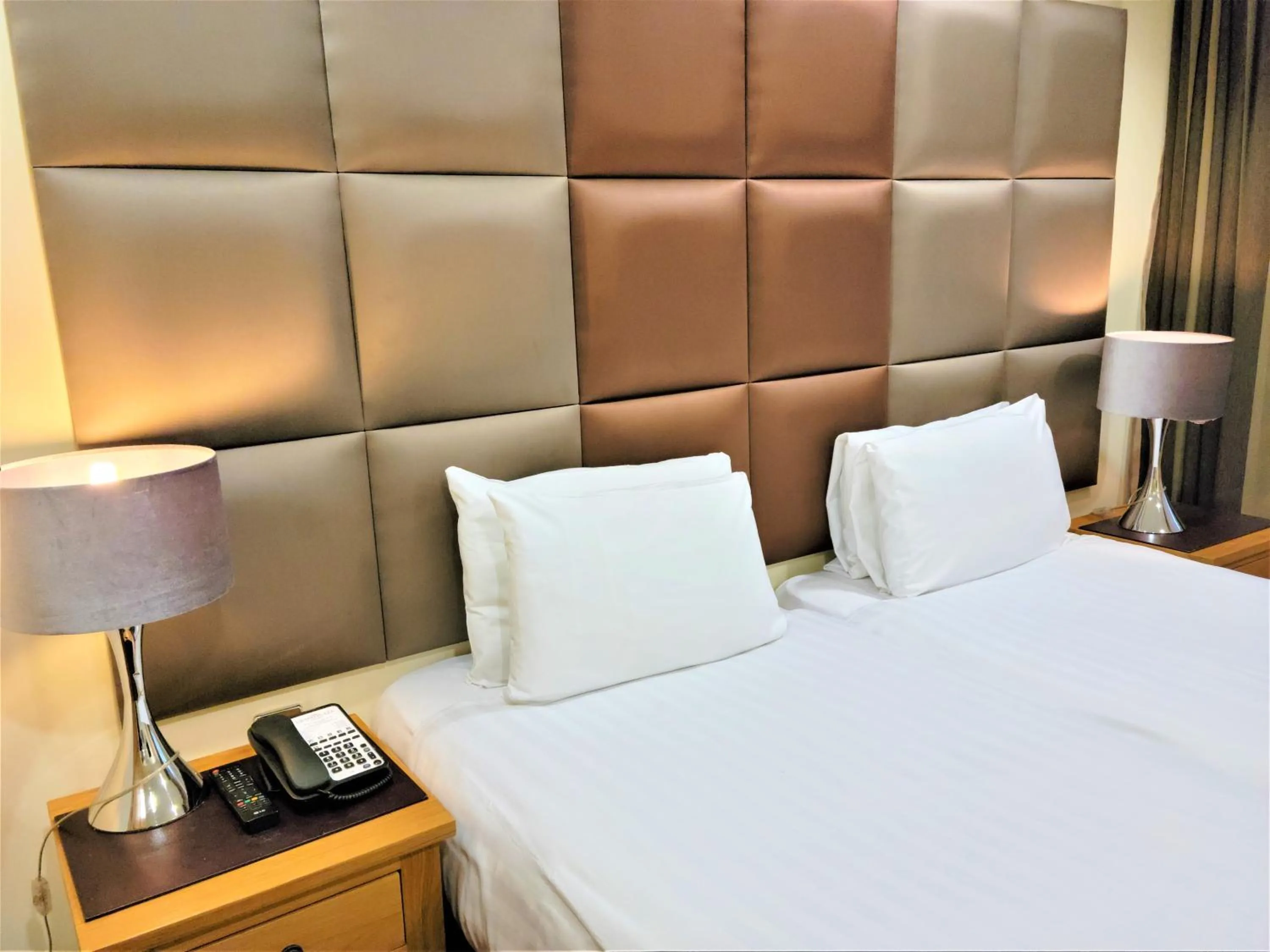 Bed in Grand Plaza Serviced Apartments