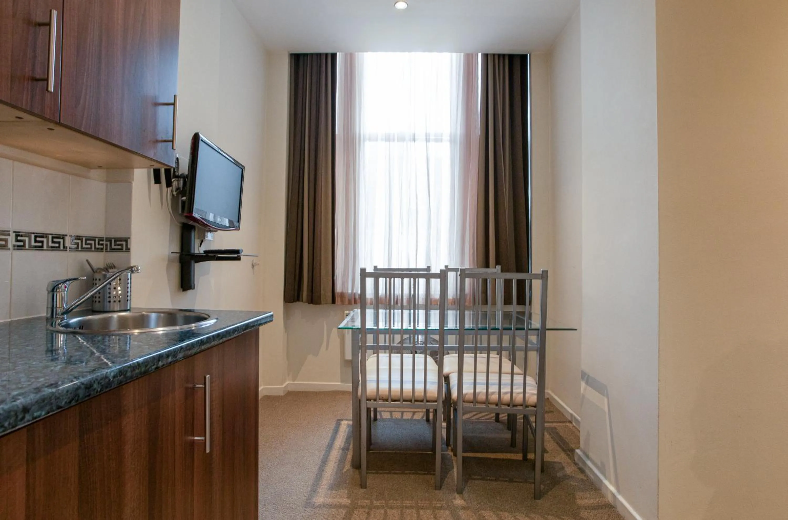 Dining area in Grand Plaza Serviced Apartments