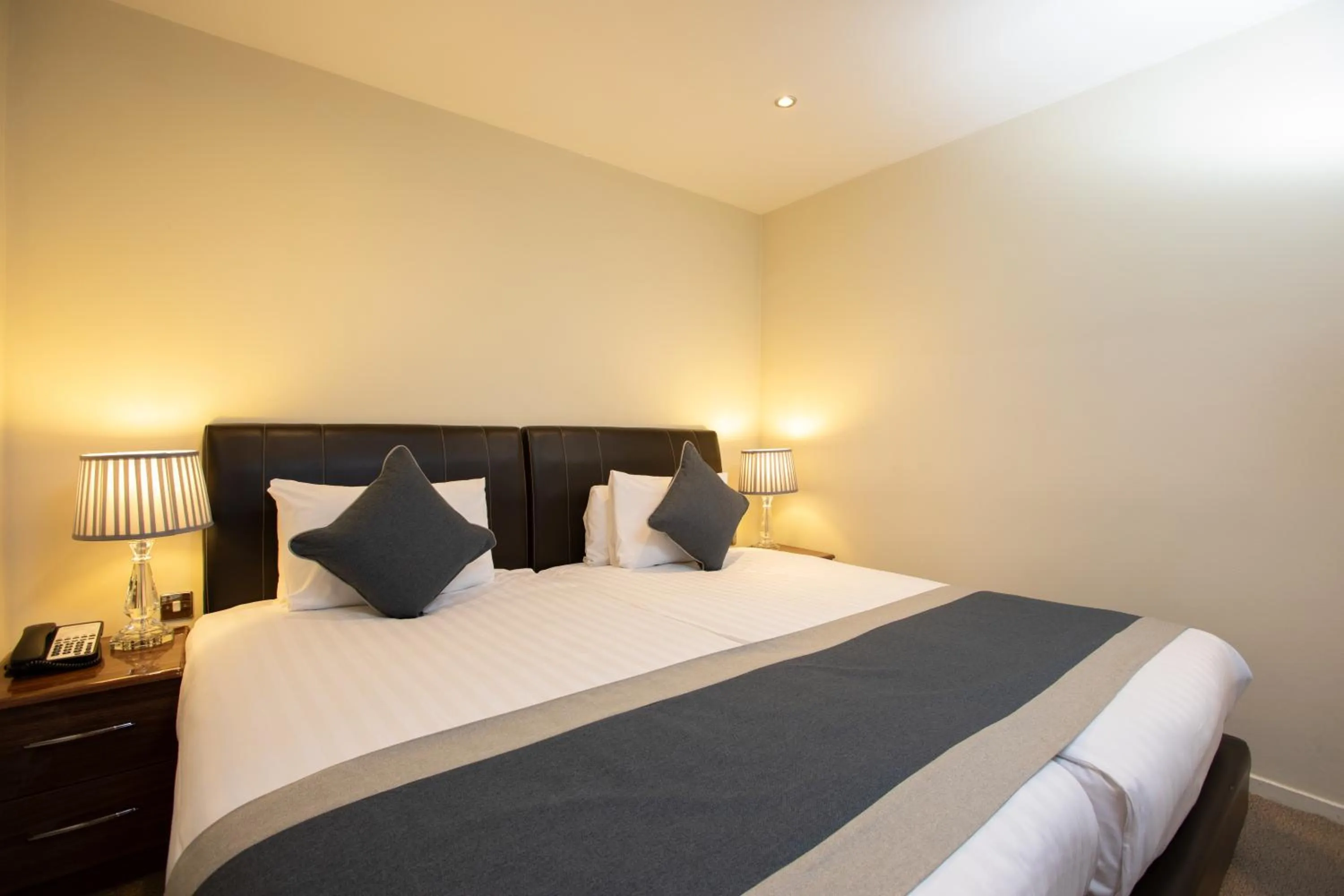 Bed in Grand Plaza Serviced Apartments