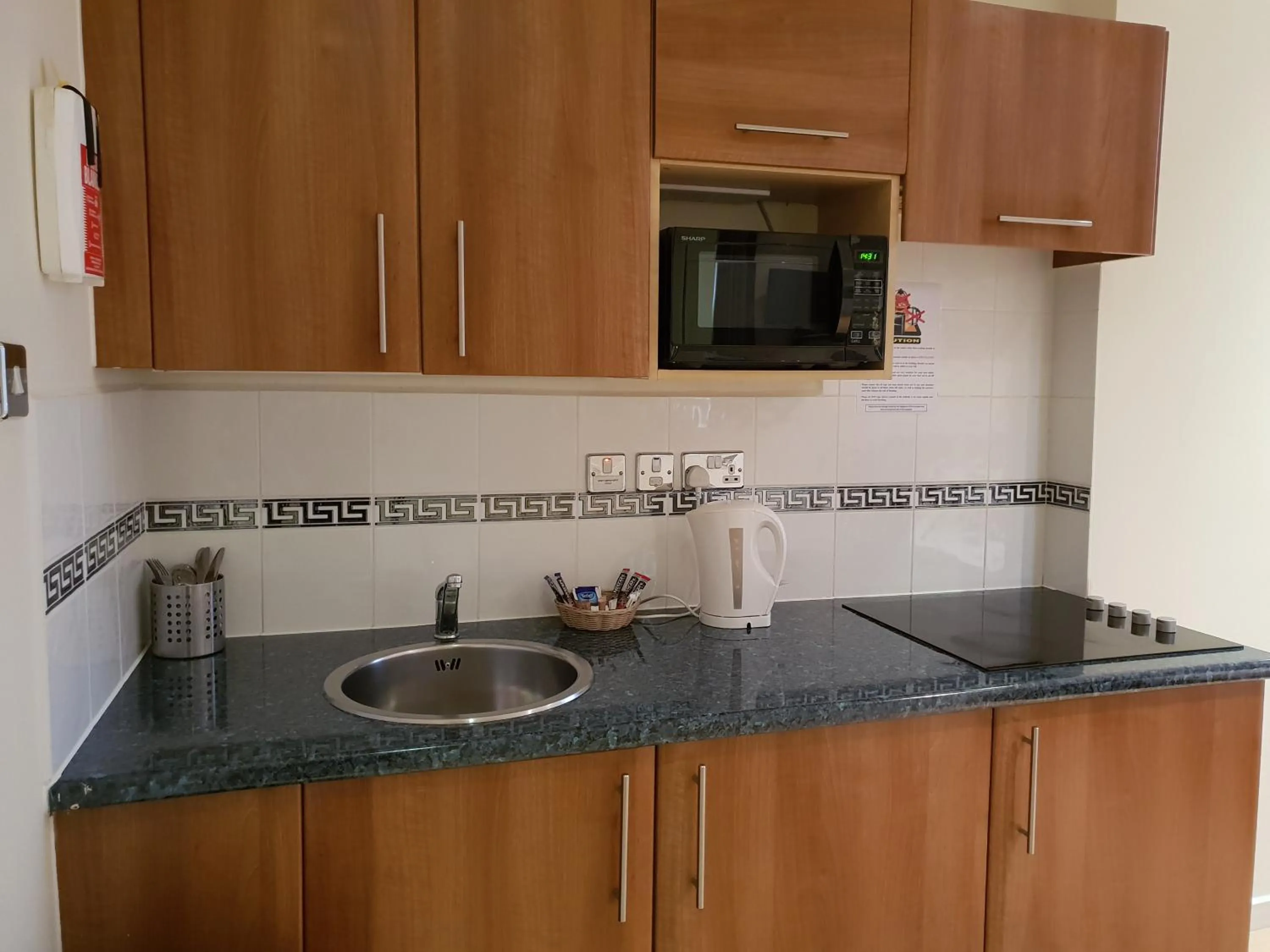 Kitchen or kitchenette in Grand Plaza Serviced Apartments