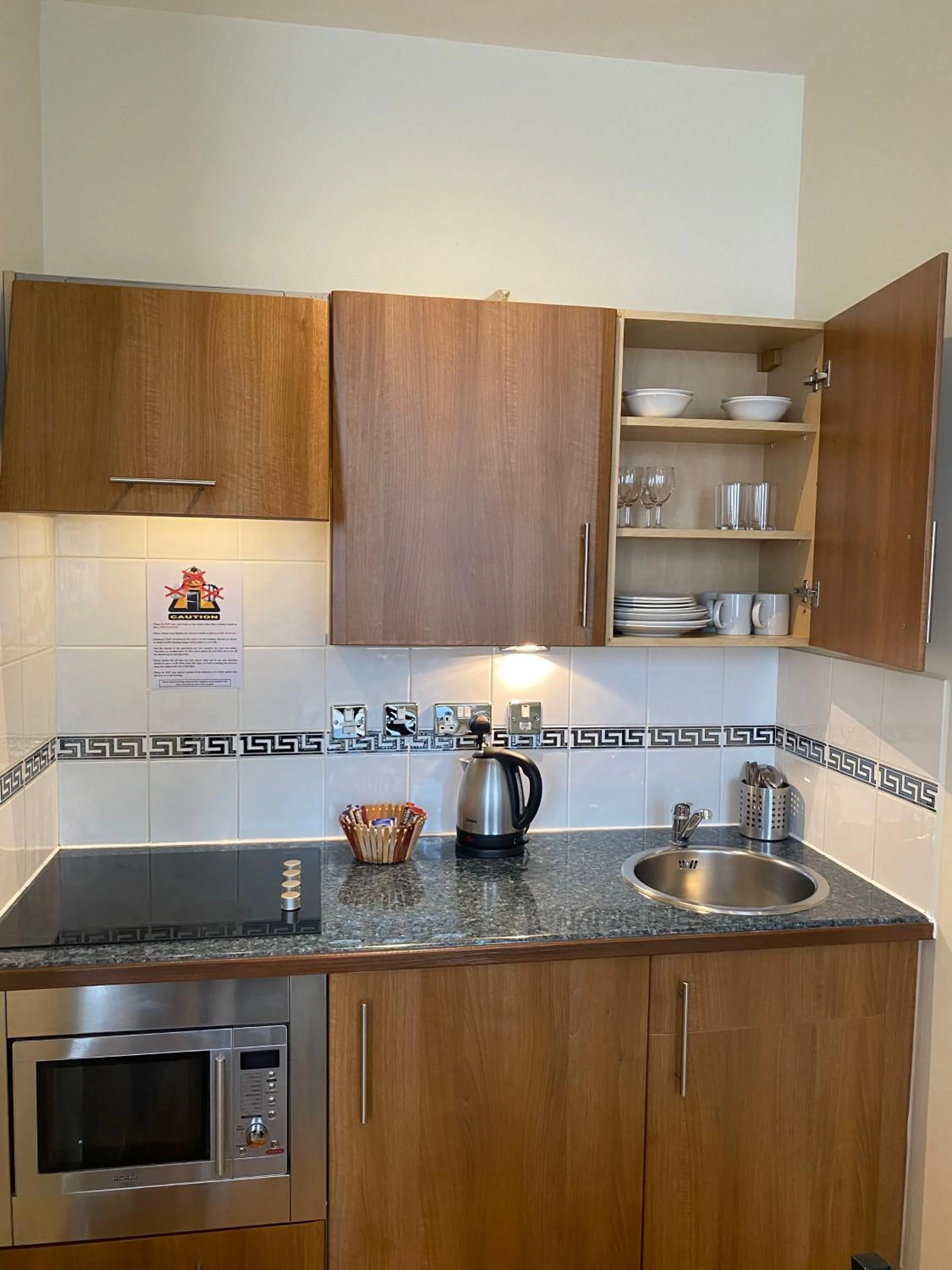 Kitchen or kitchenette in Grand Plaza Serviced Apartments