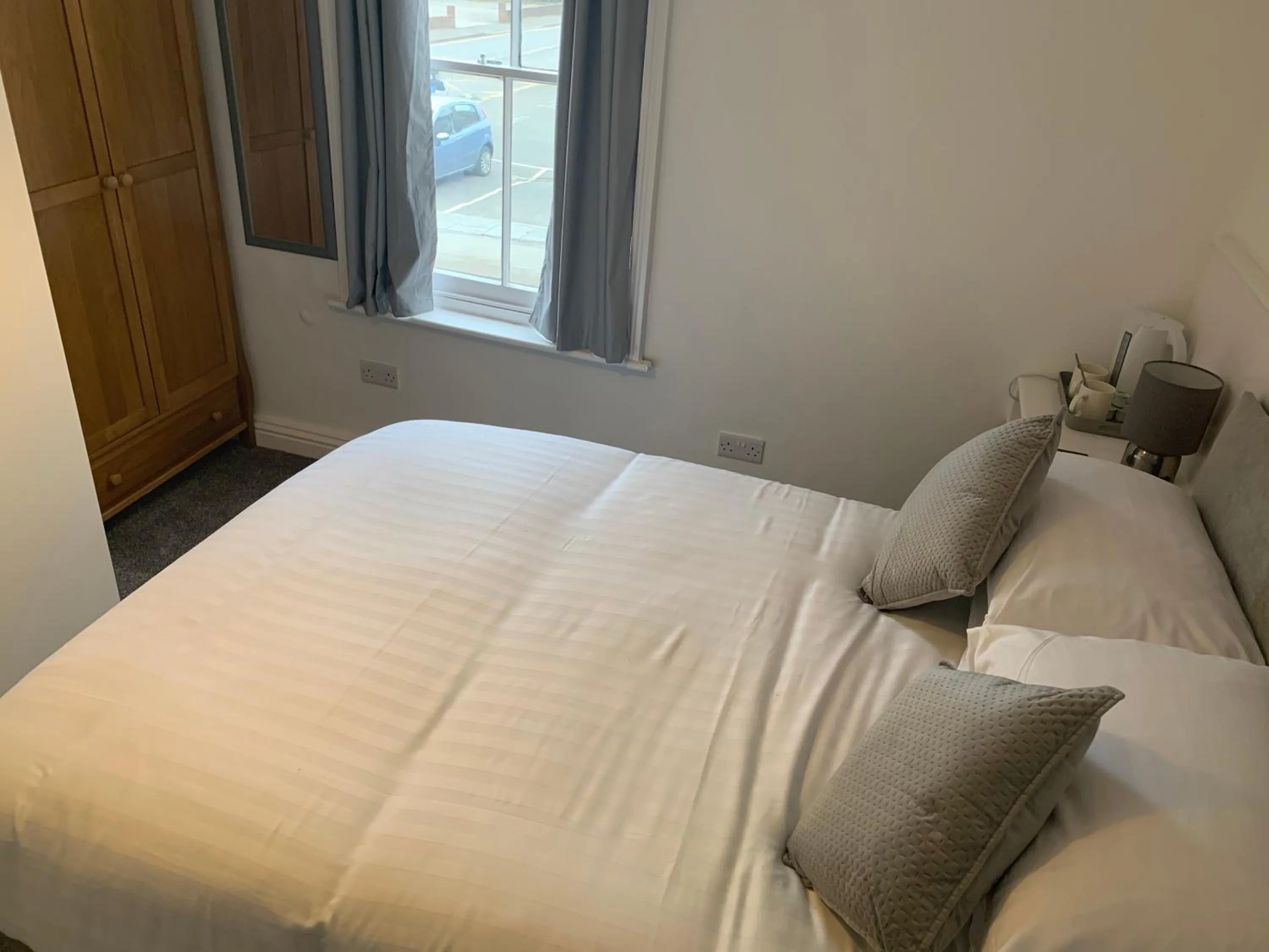 Bed in Rooms at the Inn