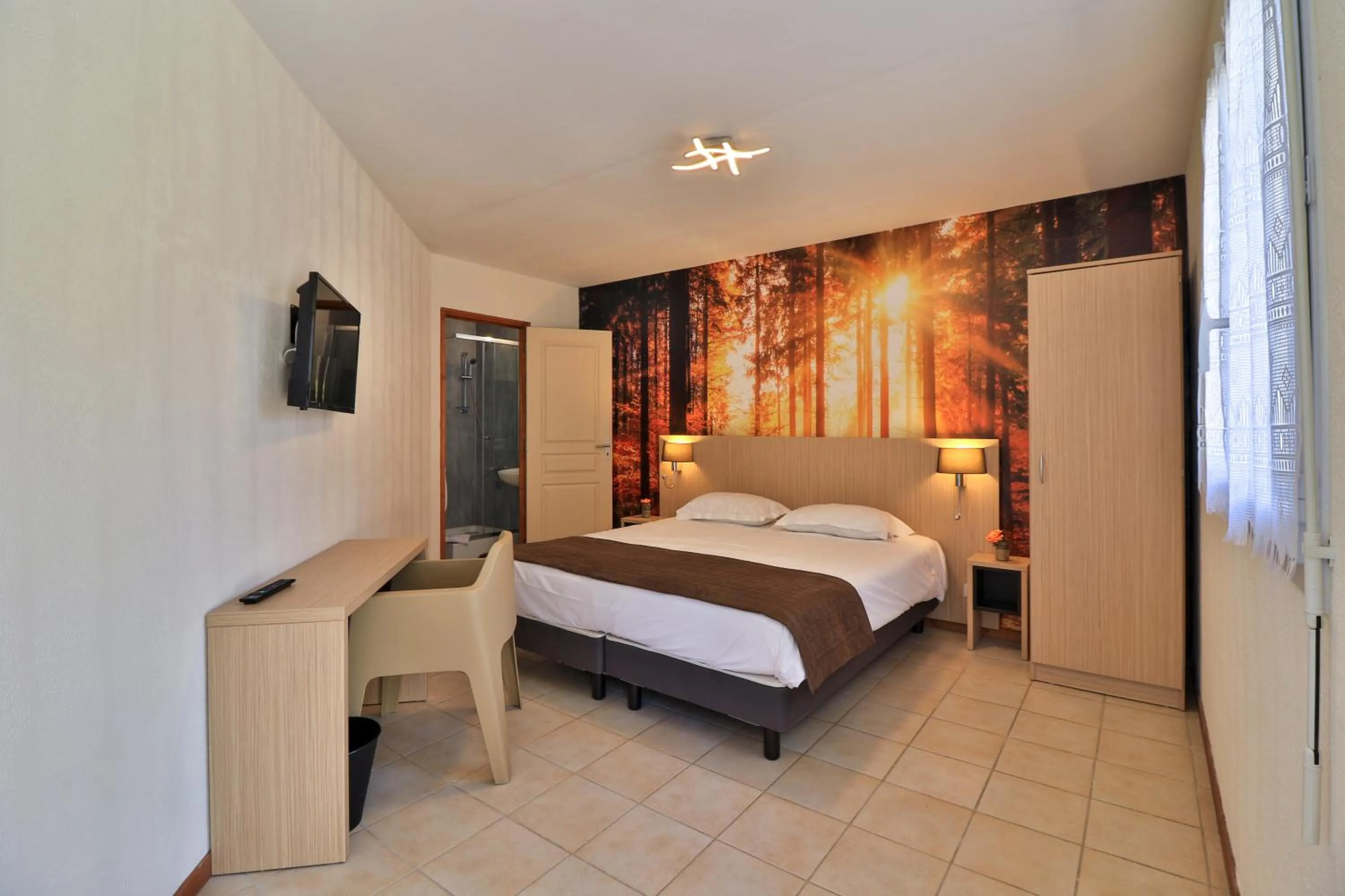 Bed in Les Arbousiers Village Hôtel Provençal