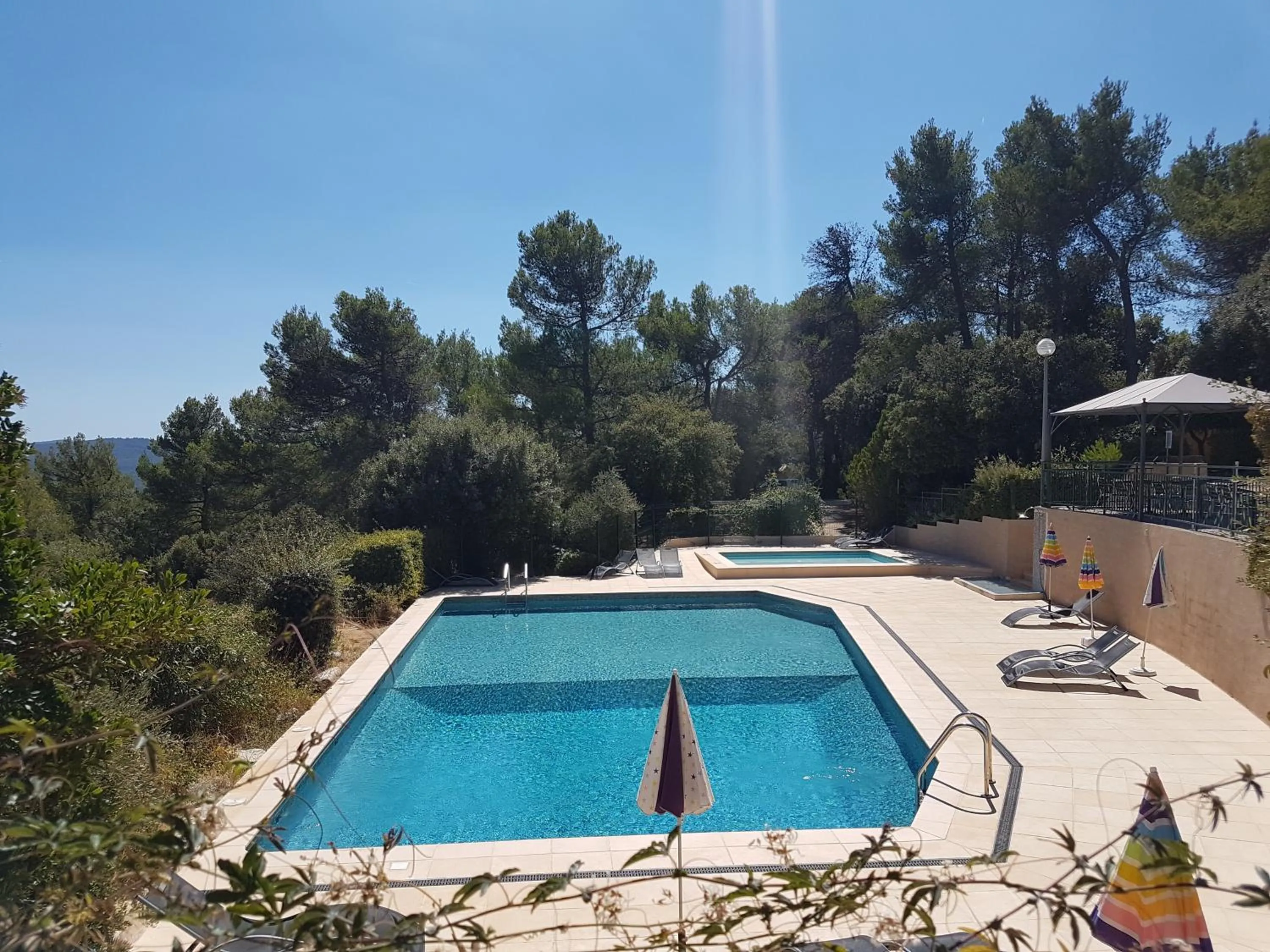 Swimming pool in Les Arbousiers Village Hôtel Provençal