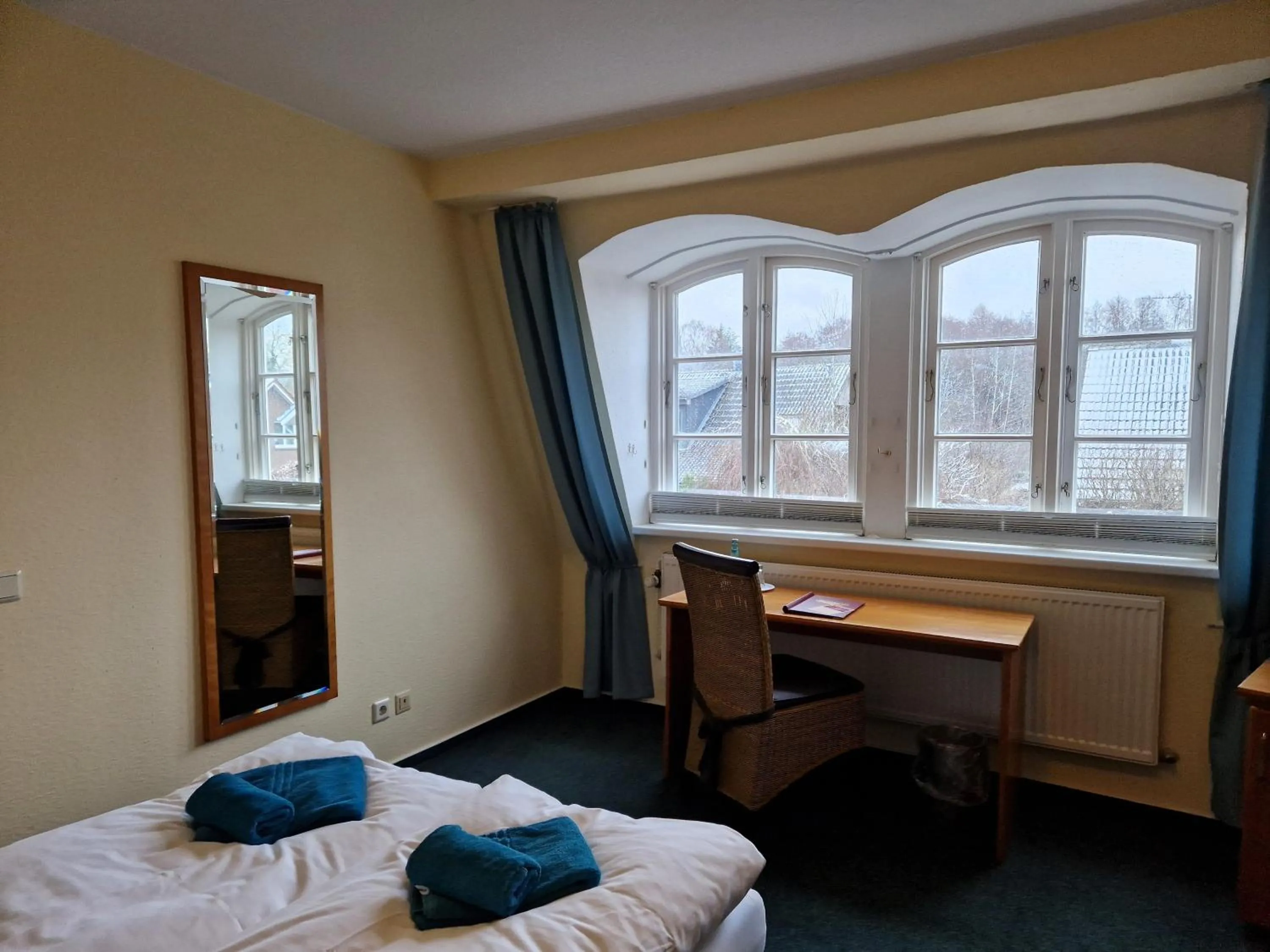 Photo of the whole room, Bed in Hotel Fährhaus Niederkleveez