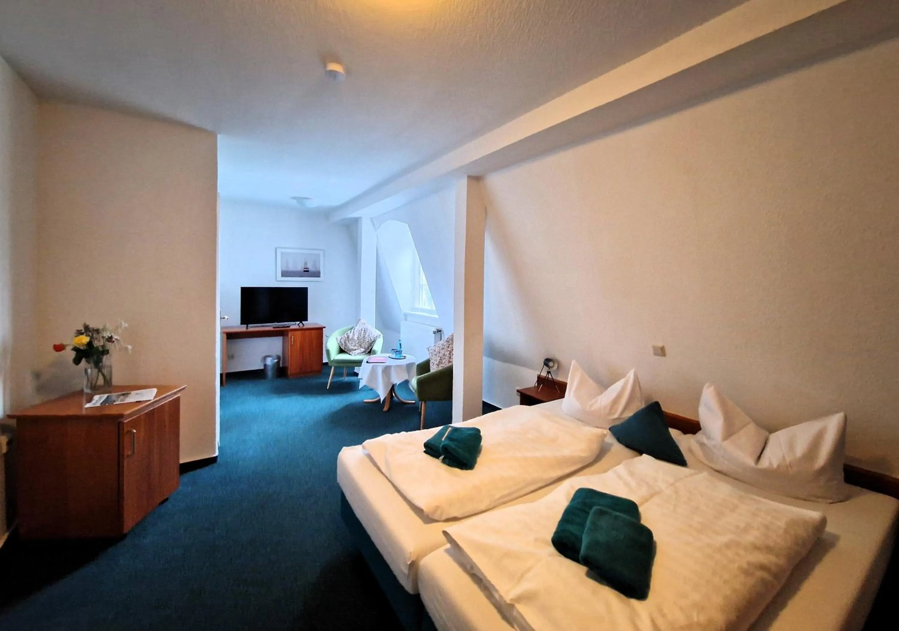 Photo of the whole room, Bed in Hotel Fährhaus Niederkleveez