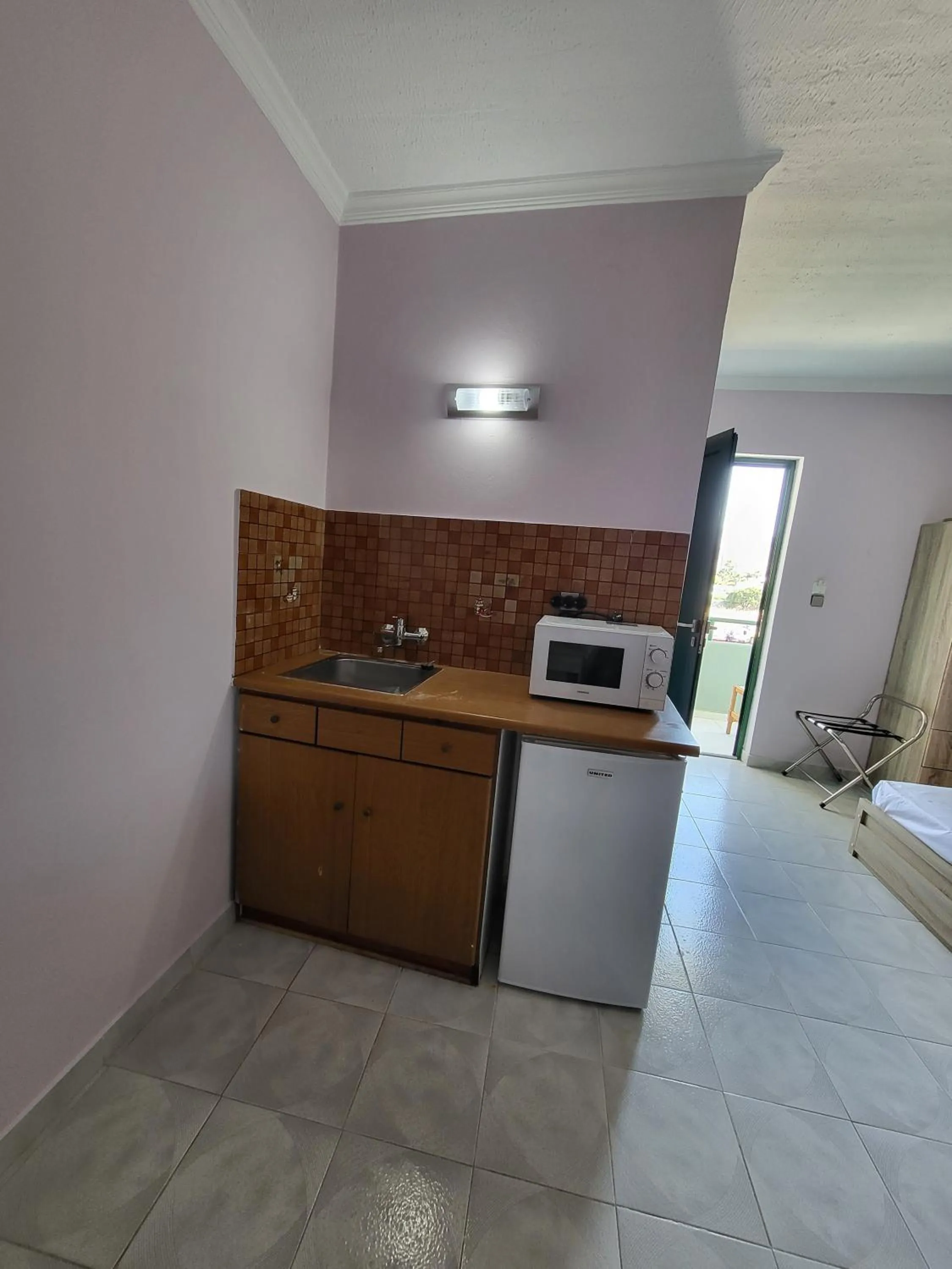 Kitchen or kitchenette in Garden City Image