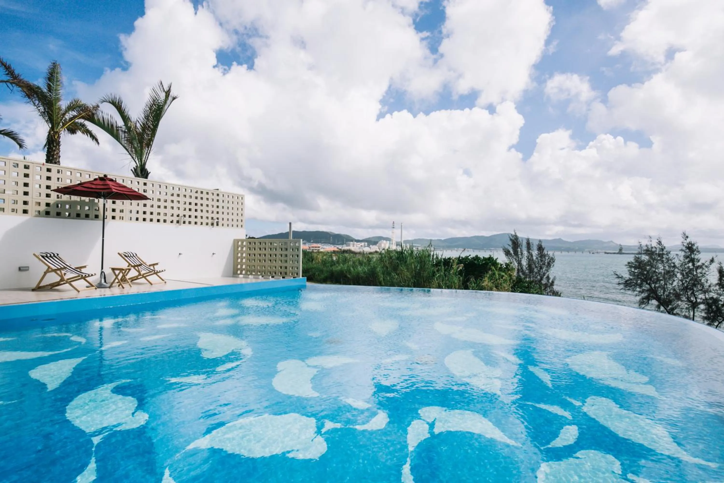 Pool view in Hideout Okinawa Uruma