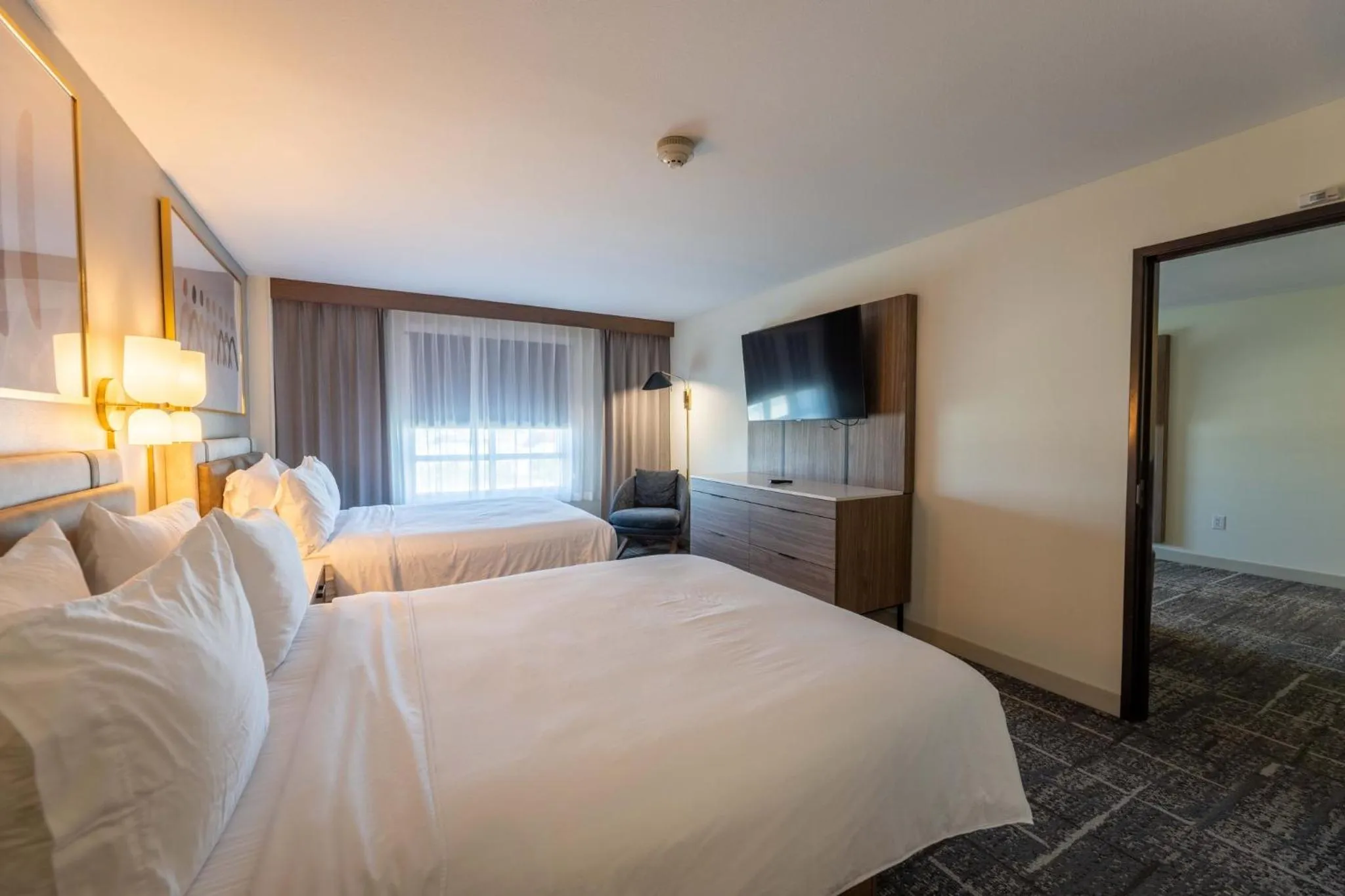 Photo of the whole room, Bed in Crowne Plaza Houston Galleria Area by IHG