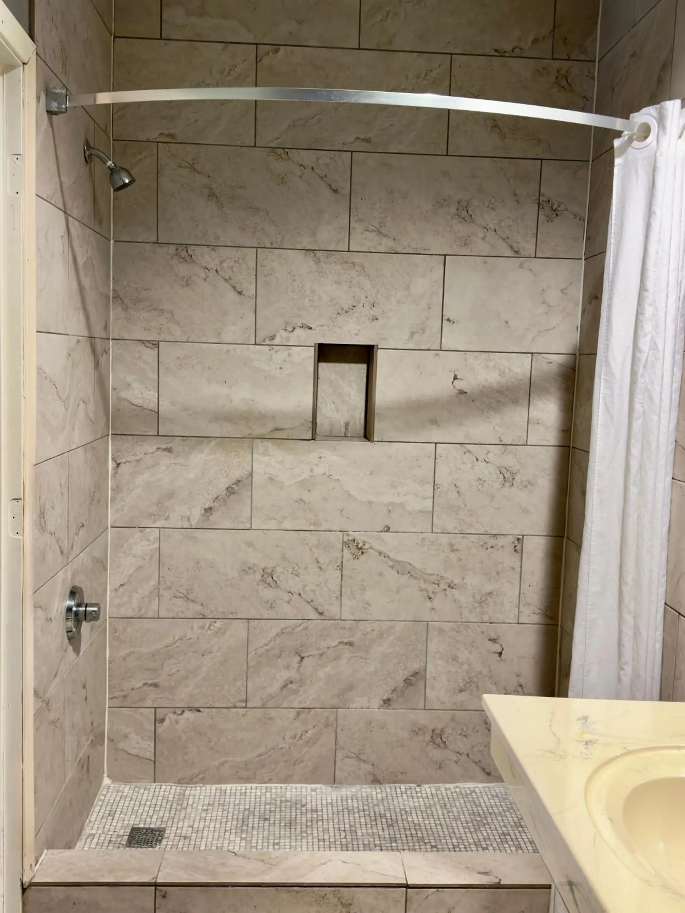 Shower in Island Suites Hobby Airport