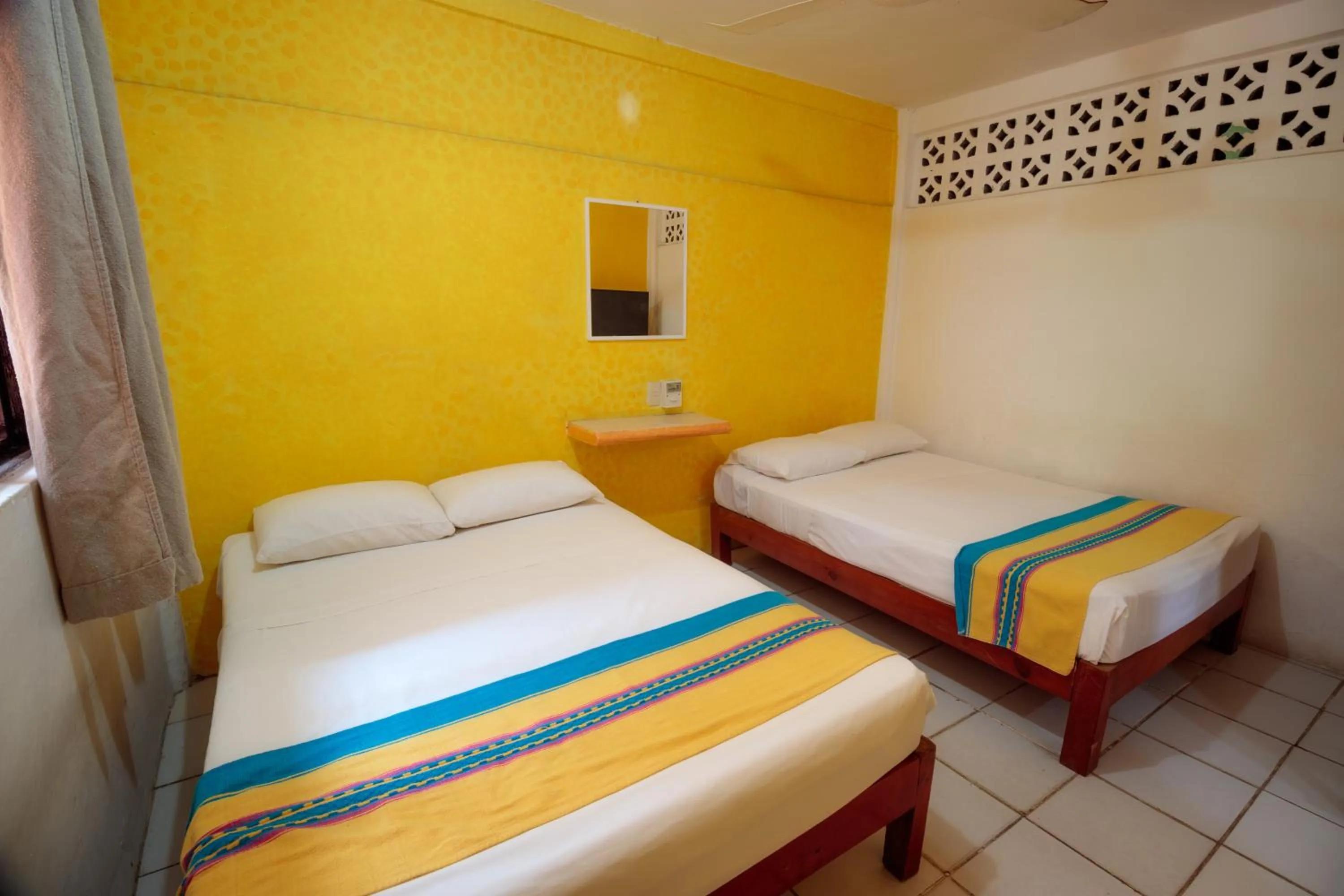 Bedroom in Hotel Bungalows Acuario