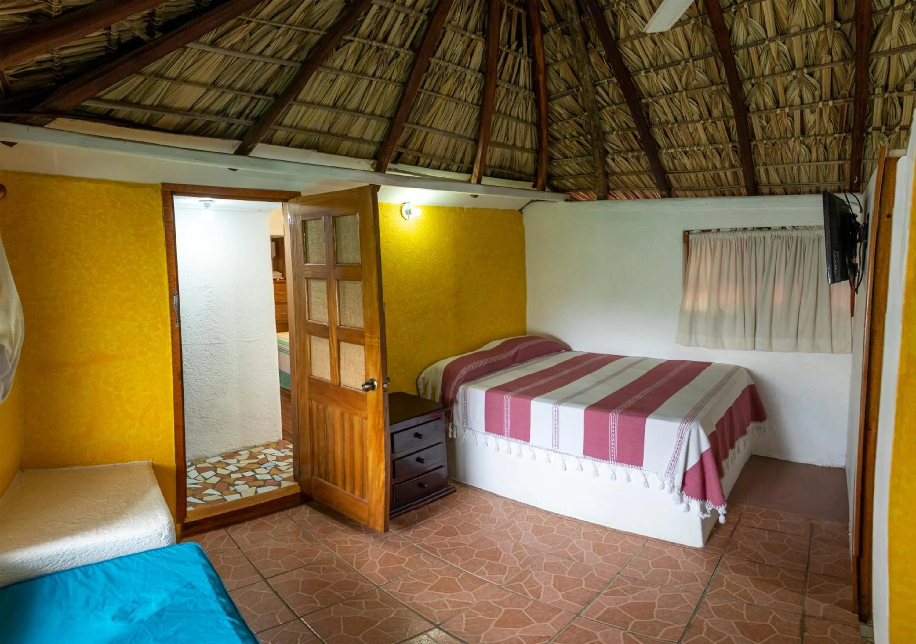 Bed in Hotel Bungalows Acuario