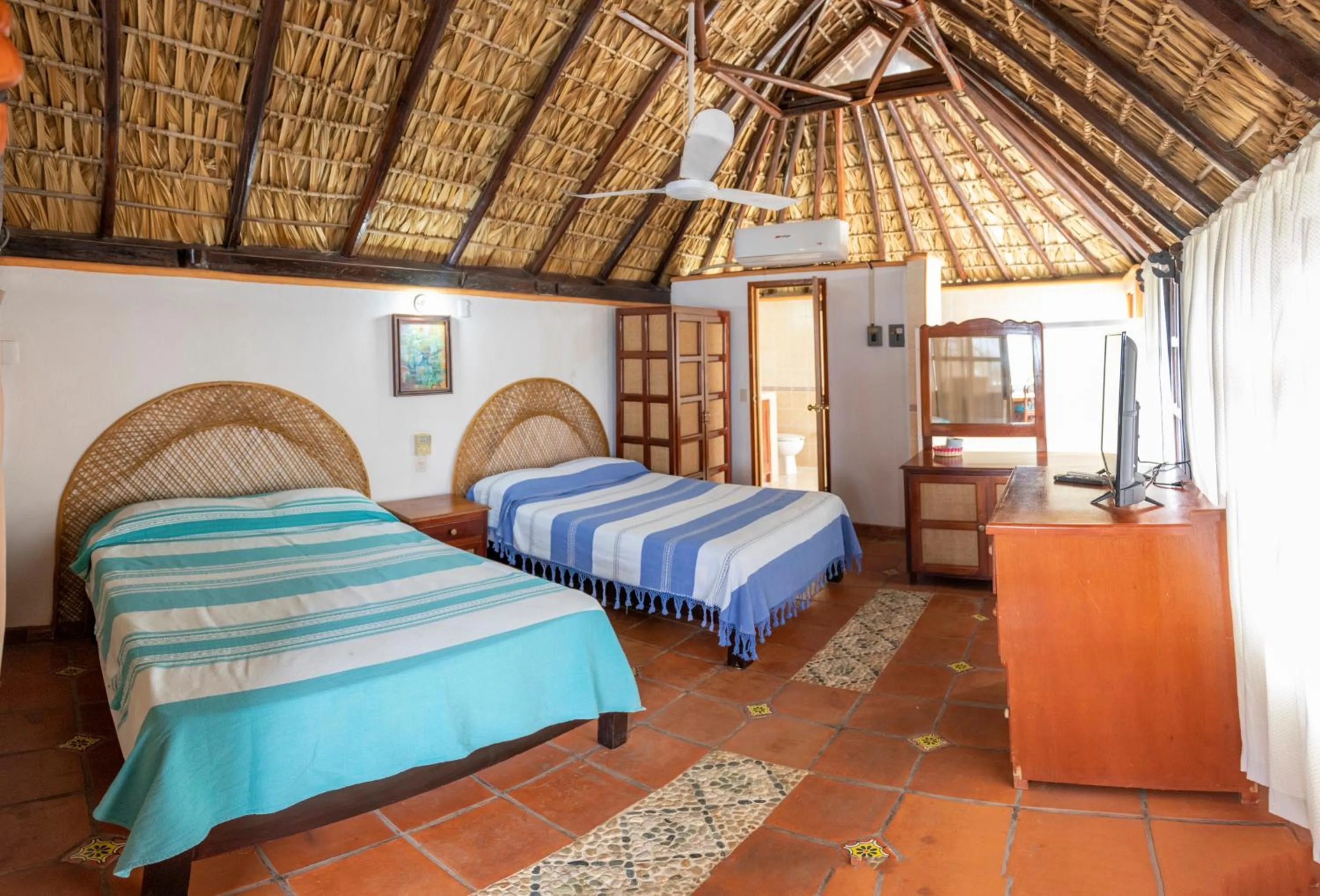Bed in Hotel Bungalows Acuario