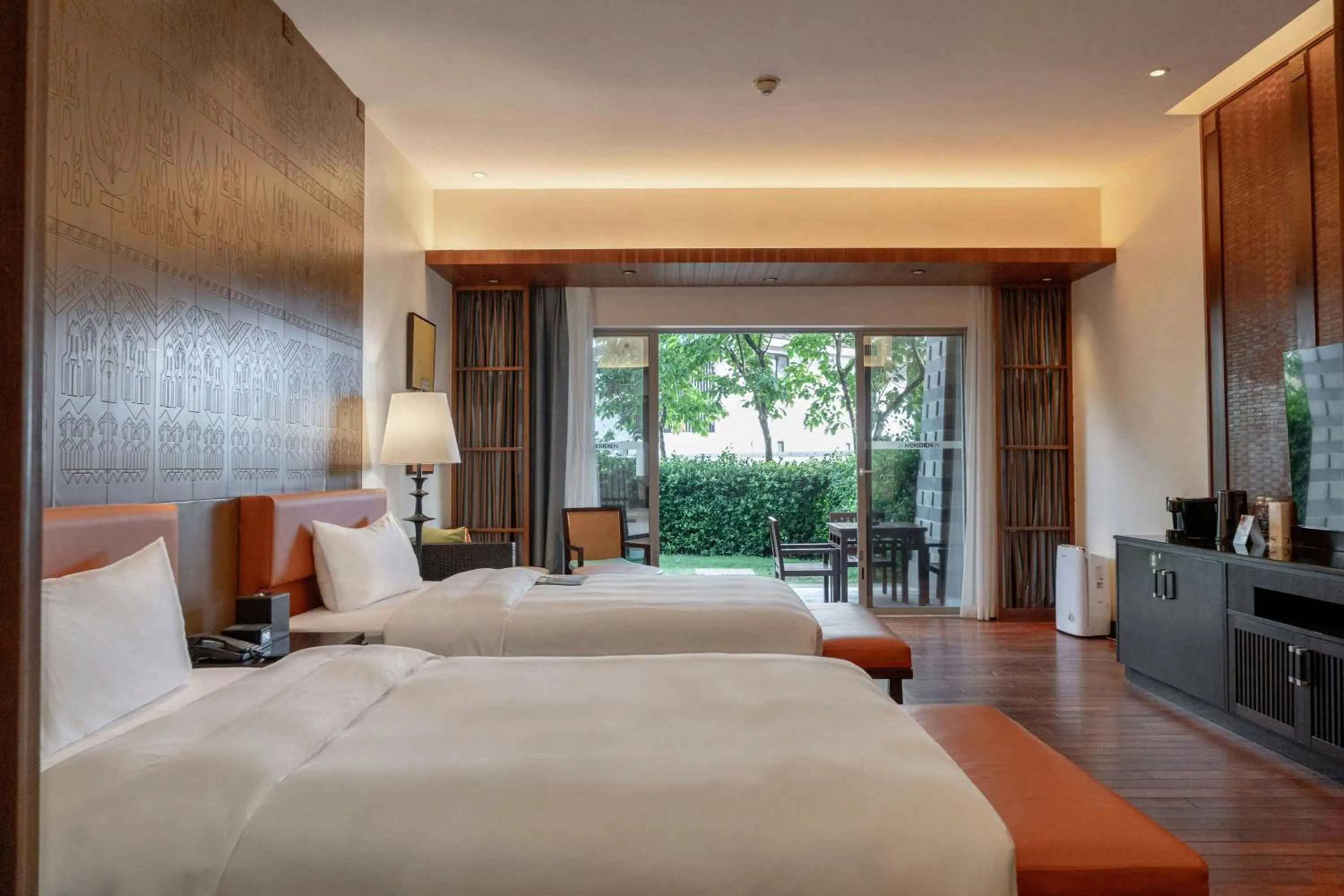 Photo of the whole room, Bed in Le Méridien Shimei Bay Beach Resort & Spa