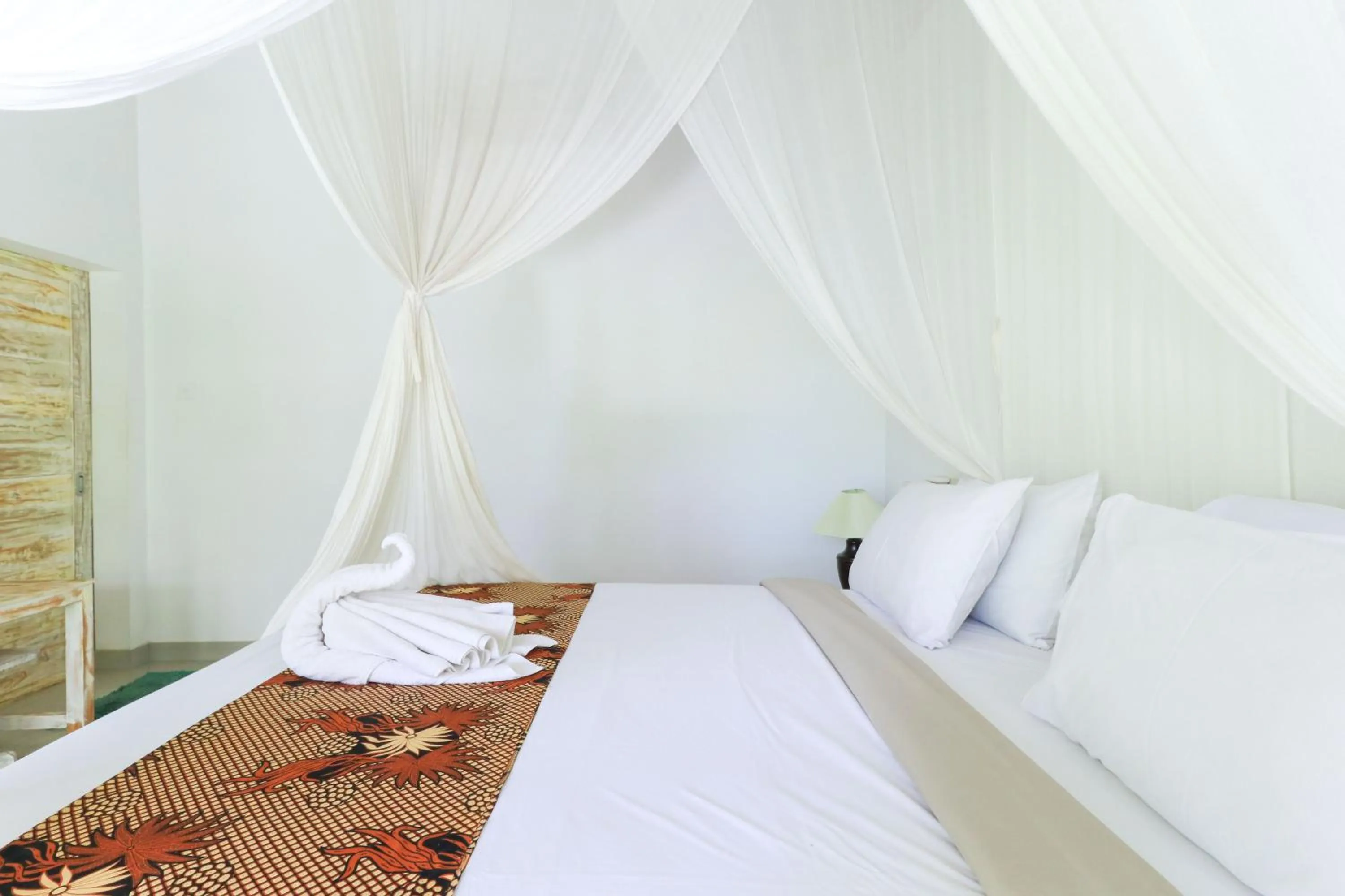Bed in Angels Bungalow Nusa Penida