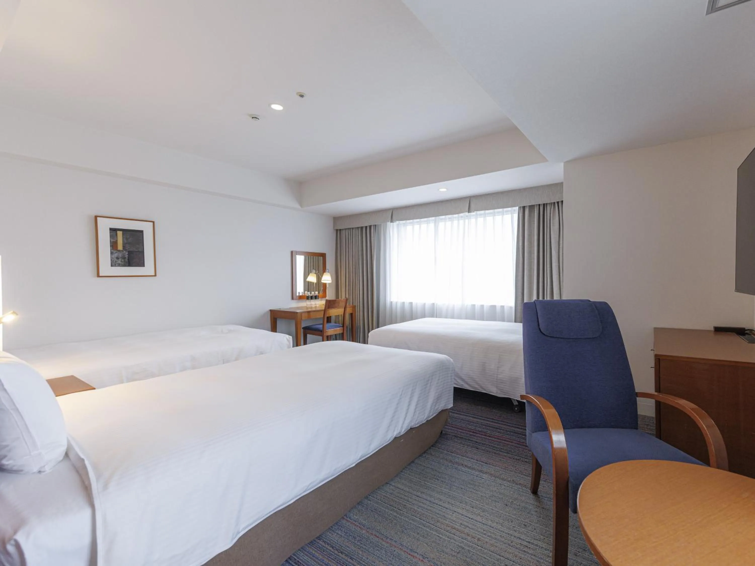 Bed in JR Kyushu Station Hotel Kokura