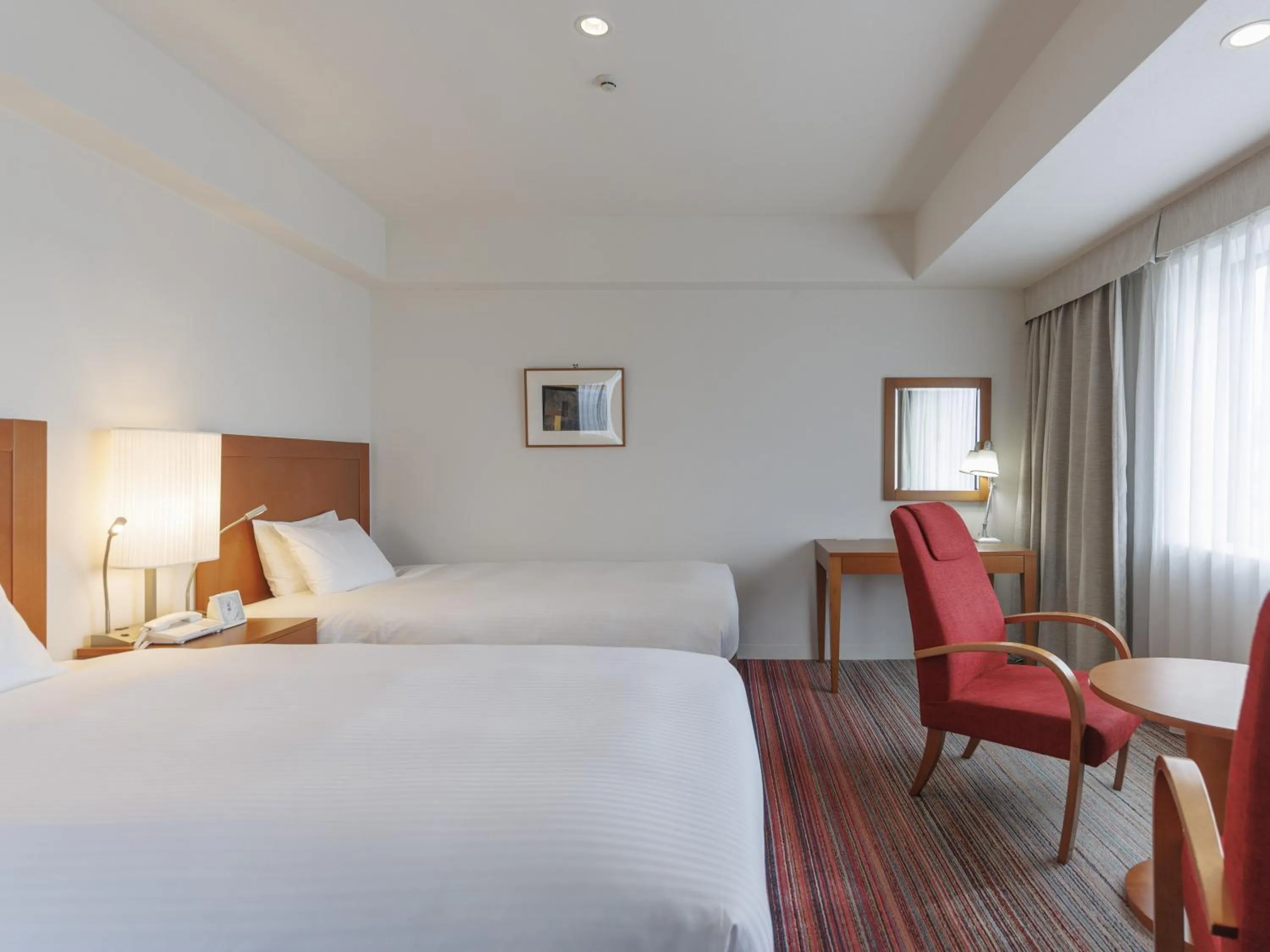 Bed in JR Kyushu Station Hotel Kokura