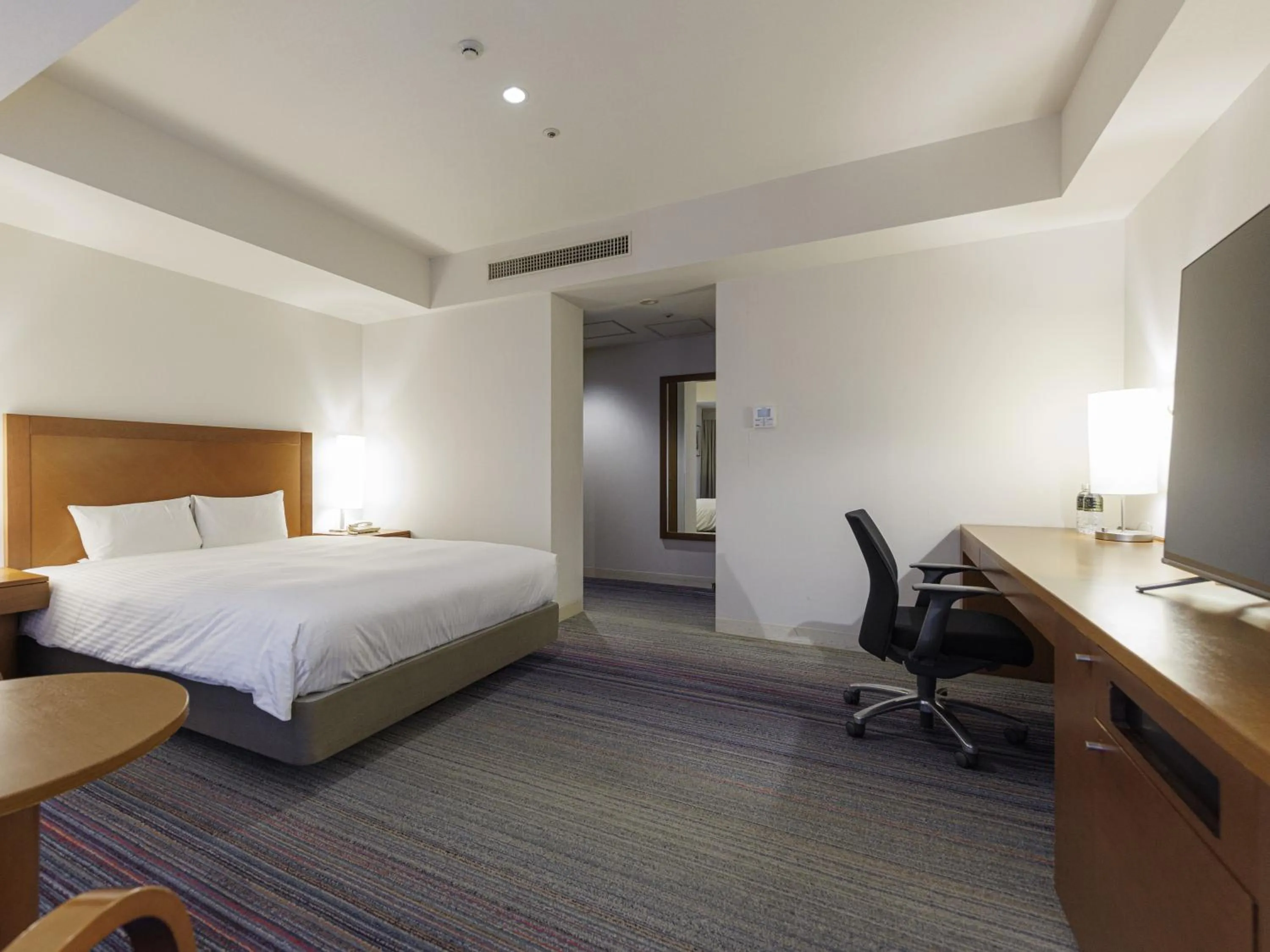 Bed in JR Kyushu Station Hotel Kokura