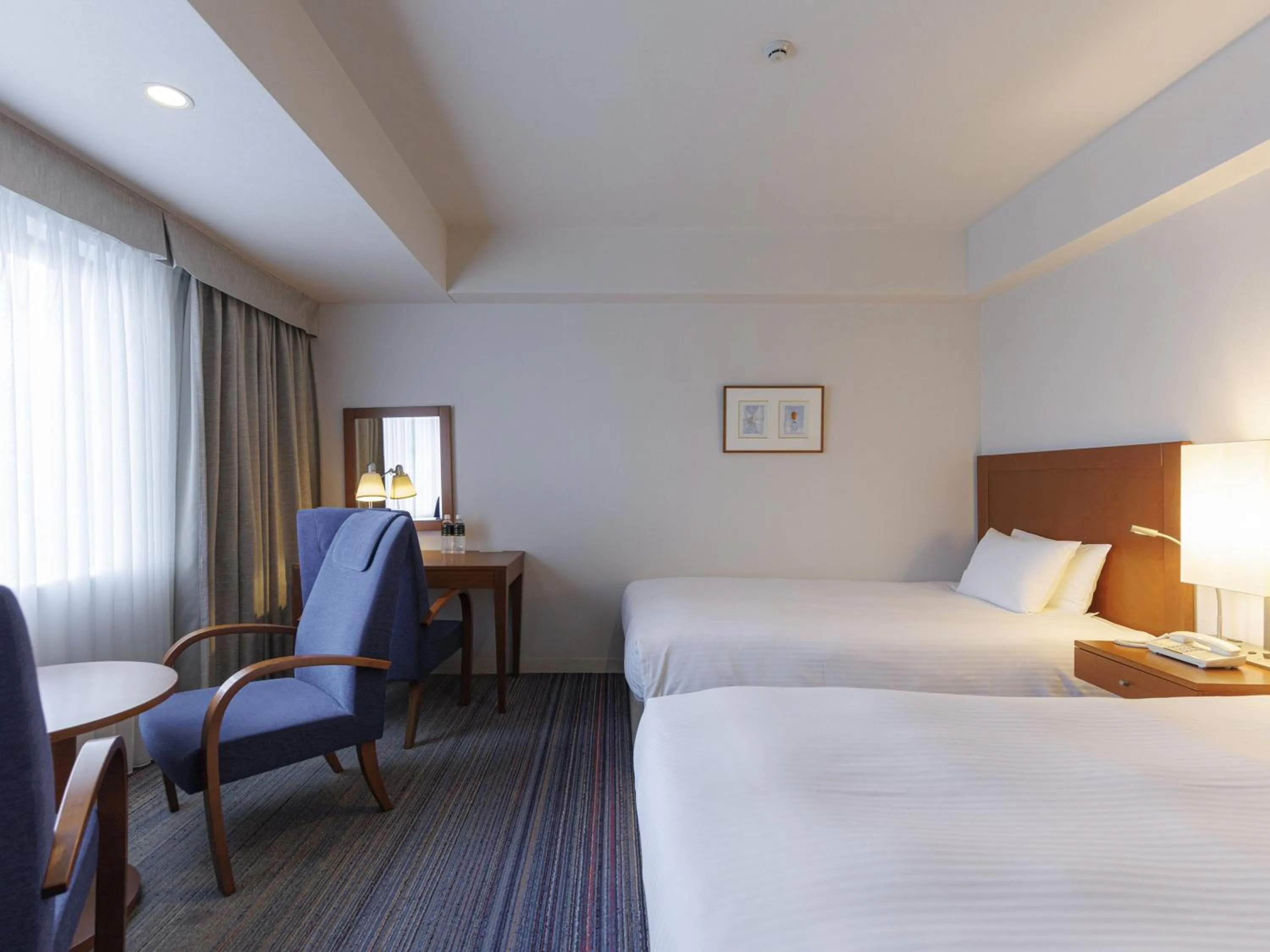 Bed in JR Kyushu Station Hotel Kokura