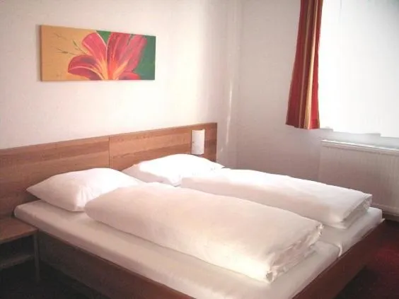 Bed in Schillerhof Hotel GARNI