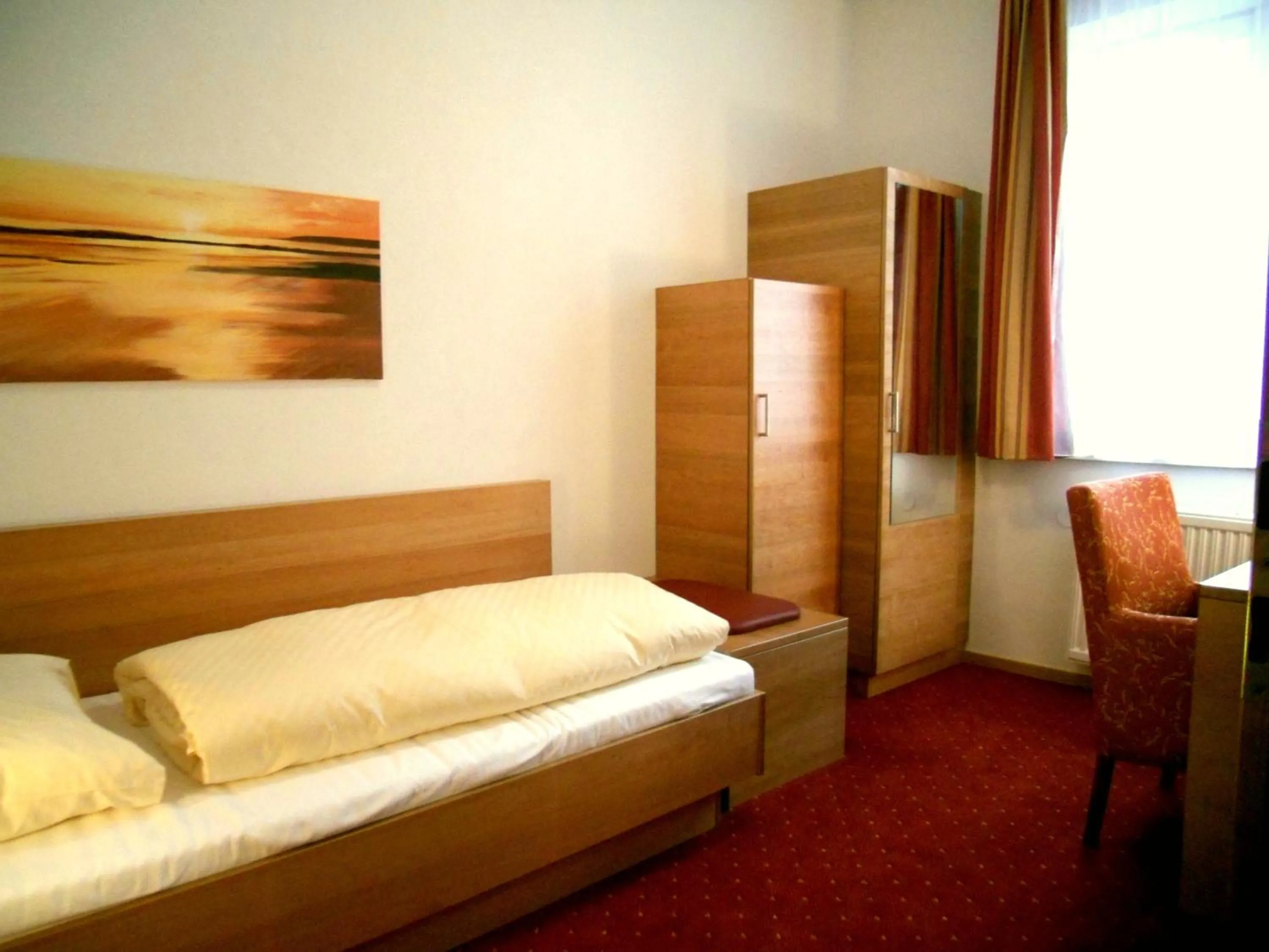 Bed in Schillerhof Hotel GARNI