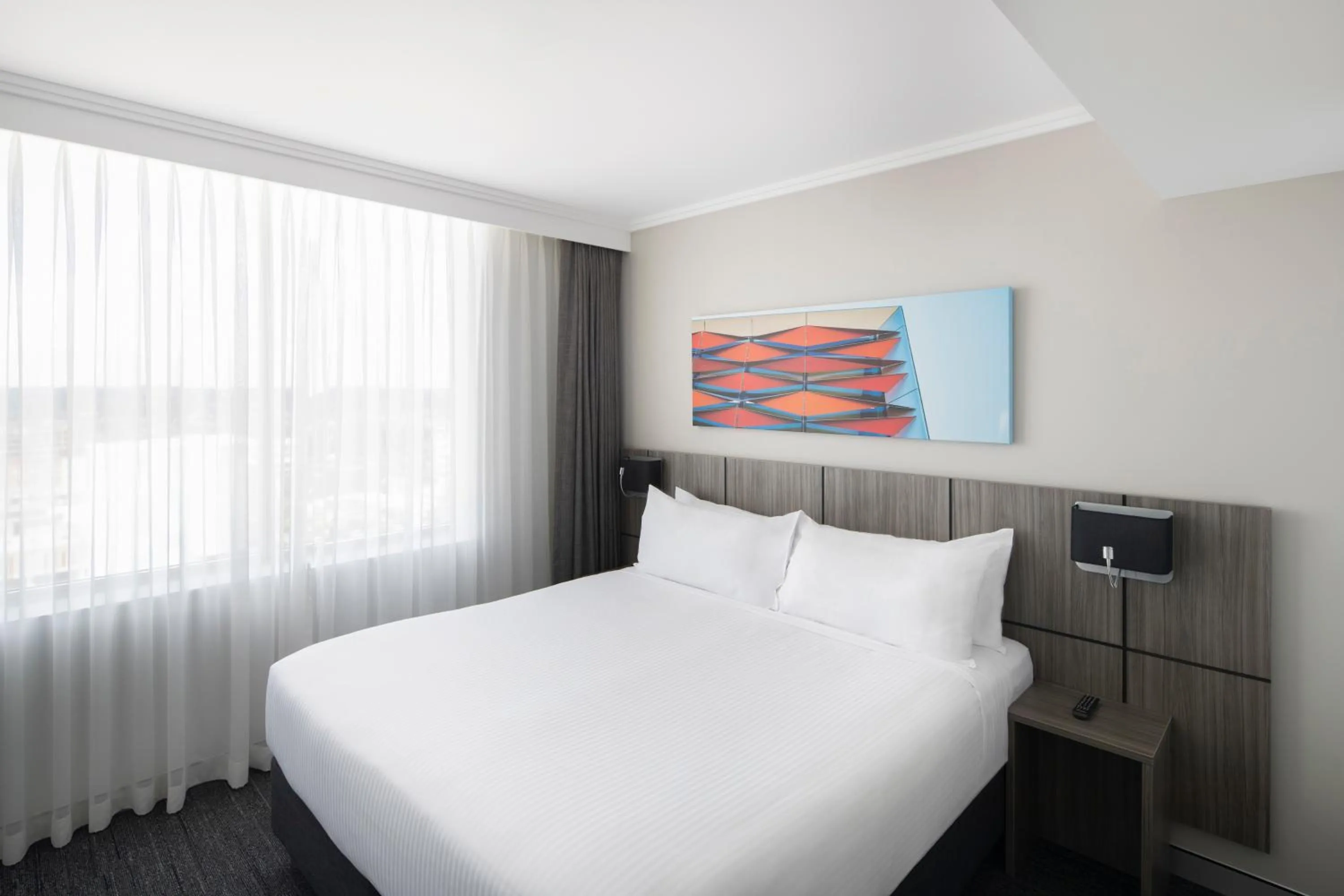 Bed in Mercure Sydney Bankstown