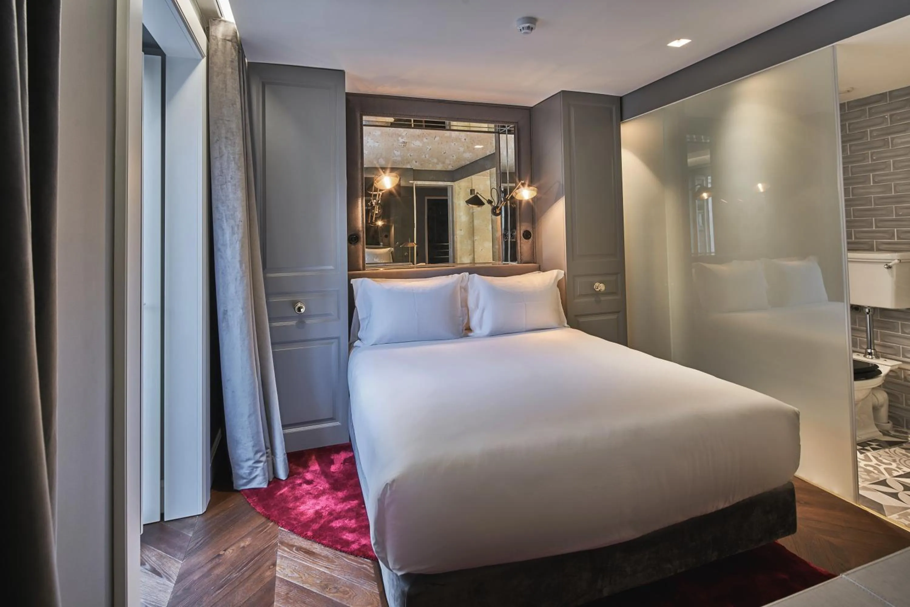 Bed in O Artista Suites by Europe