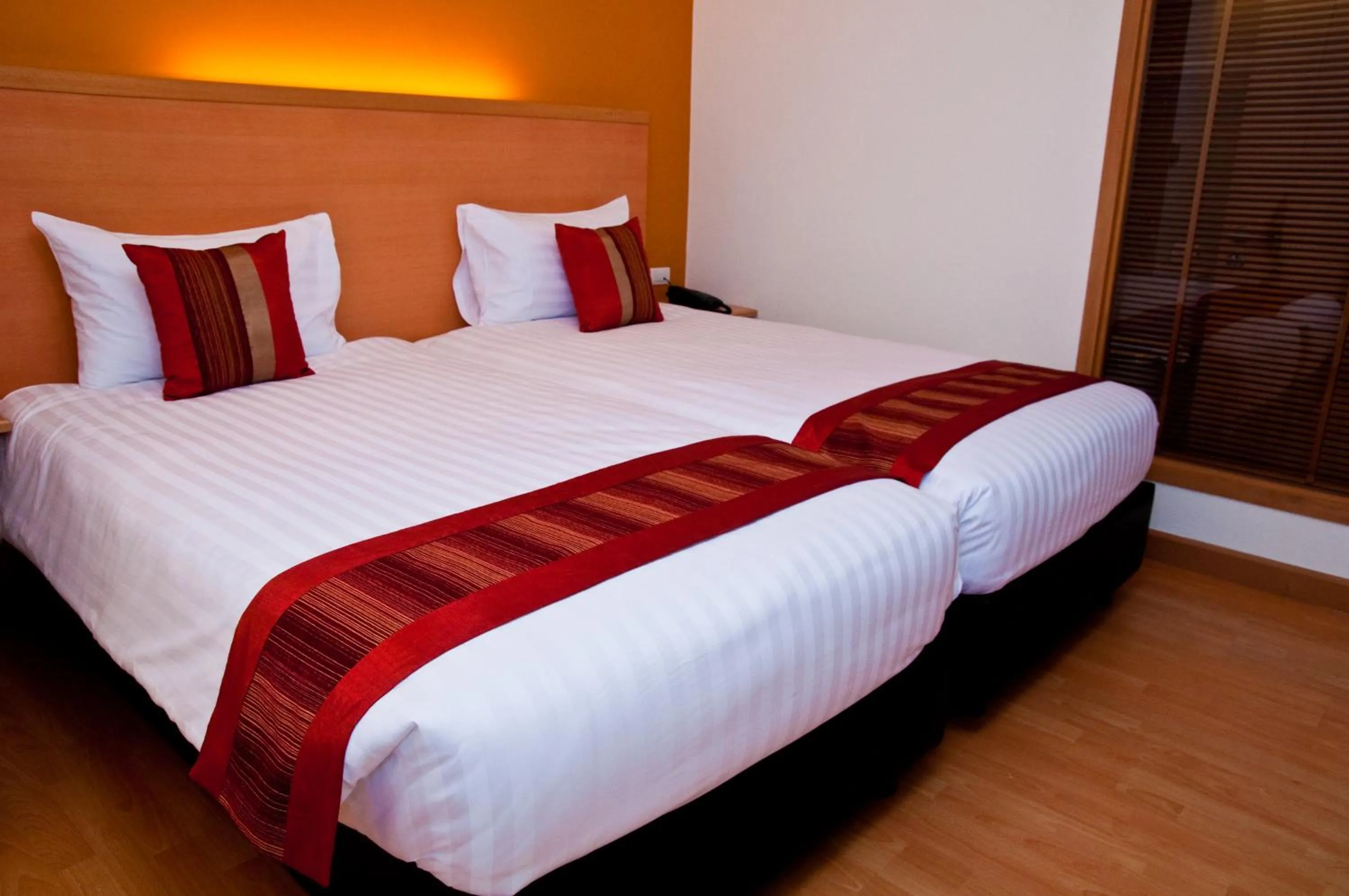 Bed in Iyarin @ Tuk Chang Hotel