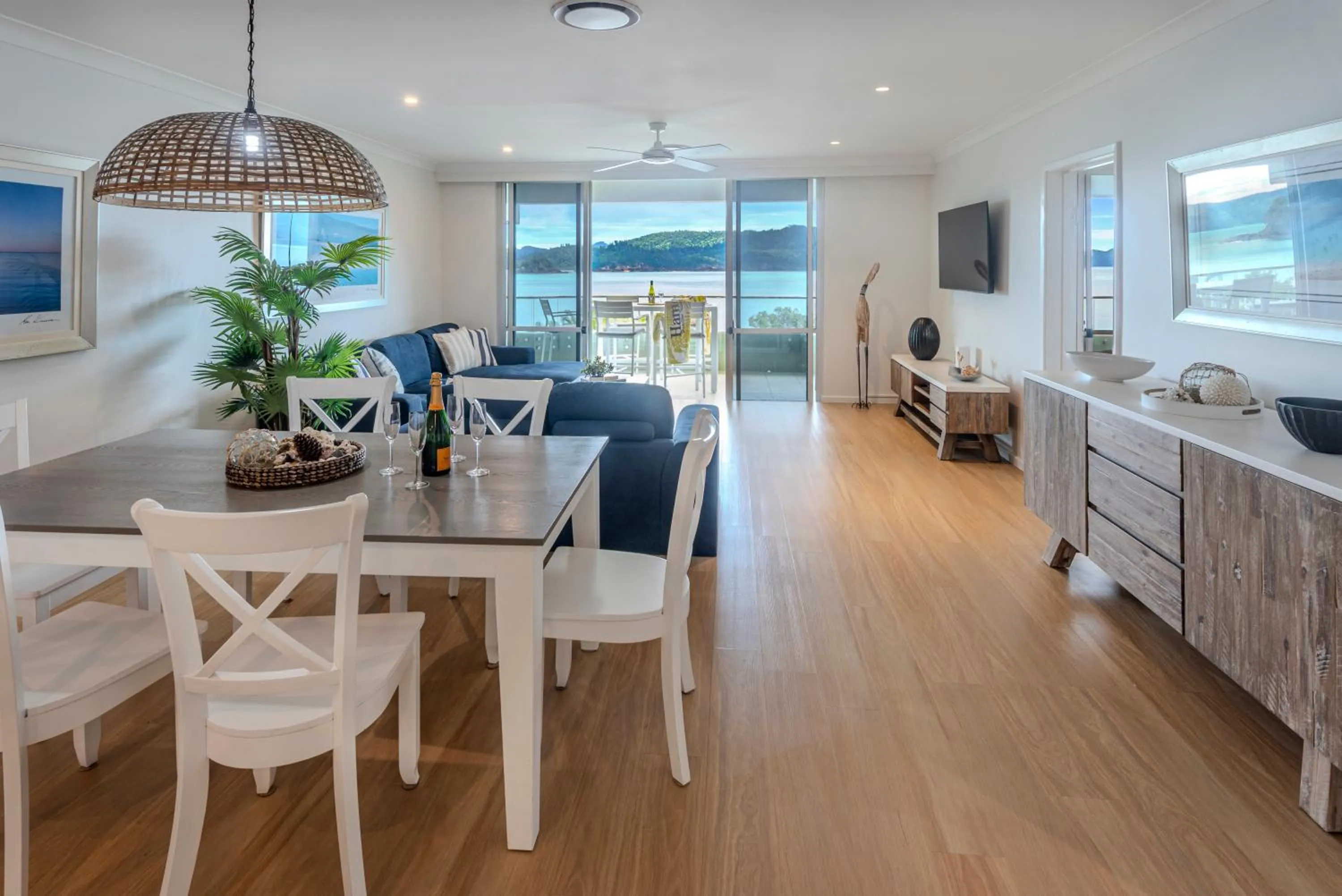 Dining area in Lagoon Beachfront Lodge 202 on Hamilton Island by HamoRent