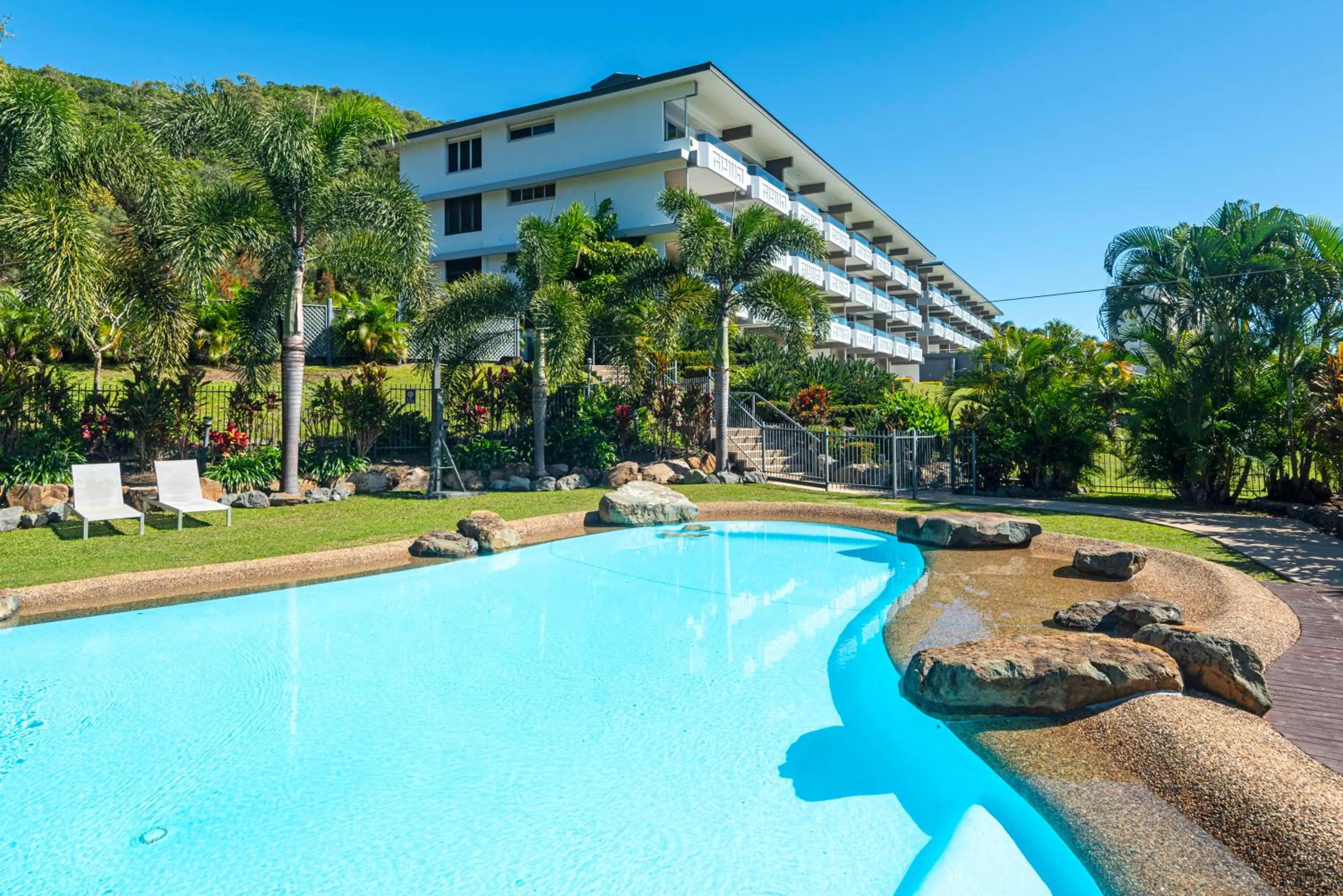 Property building in Lagoon Beachfront Lodge 202 on Hamilton Island by HamoRent