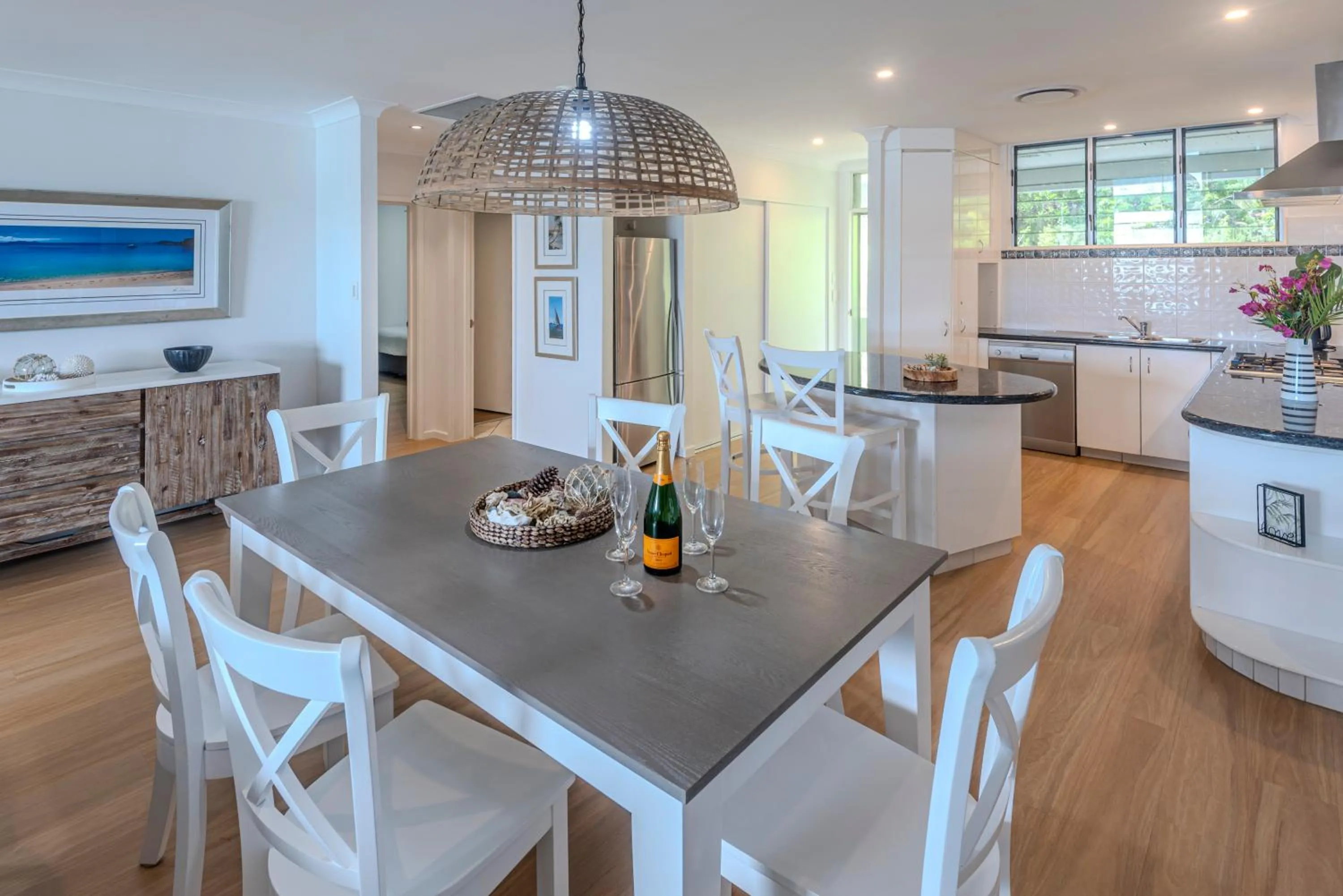 Kitchen or kitchenette in Lagoon Beachfront Lodge 202 on Hamilton Island by HamoRent