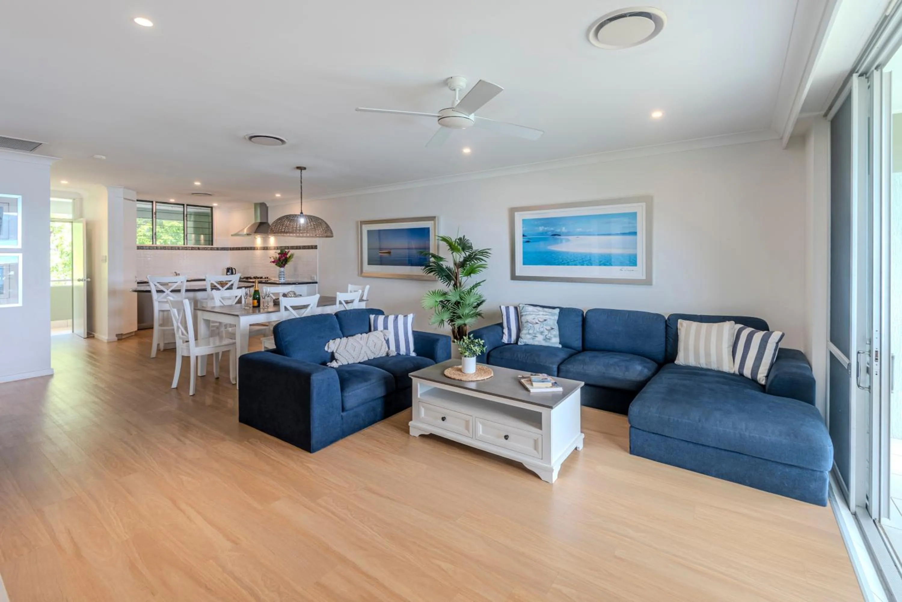 Living room in Lagoon Beachfront Lodge 202 on Hamilton Island by HamoRent