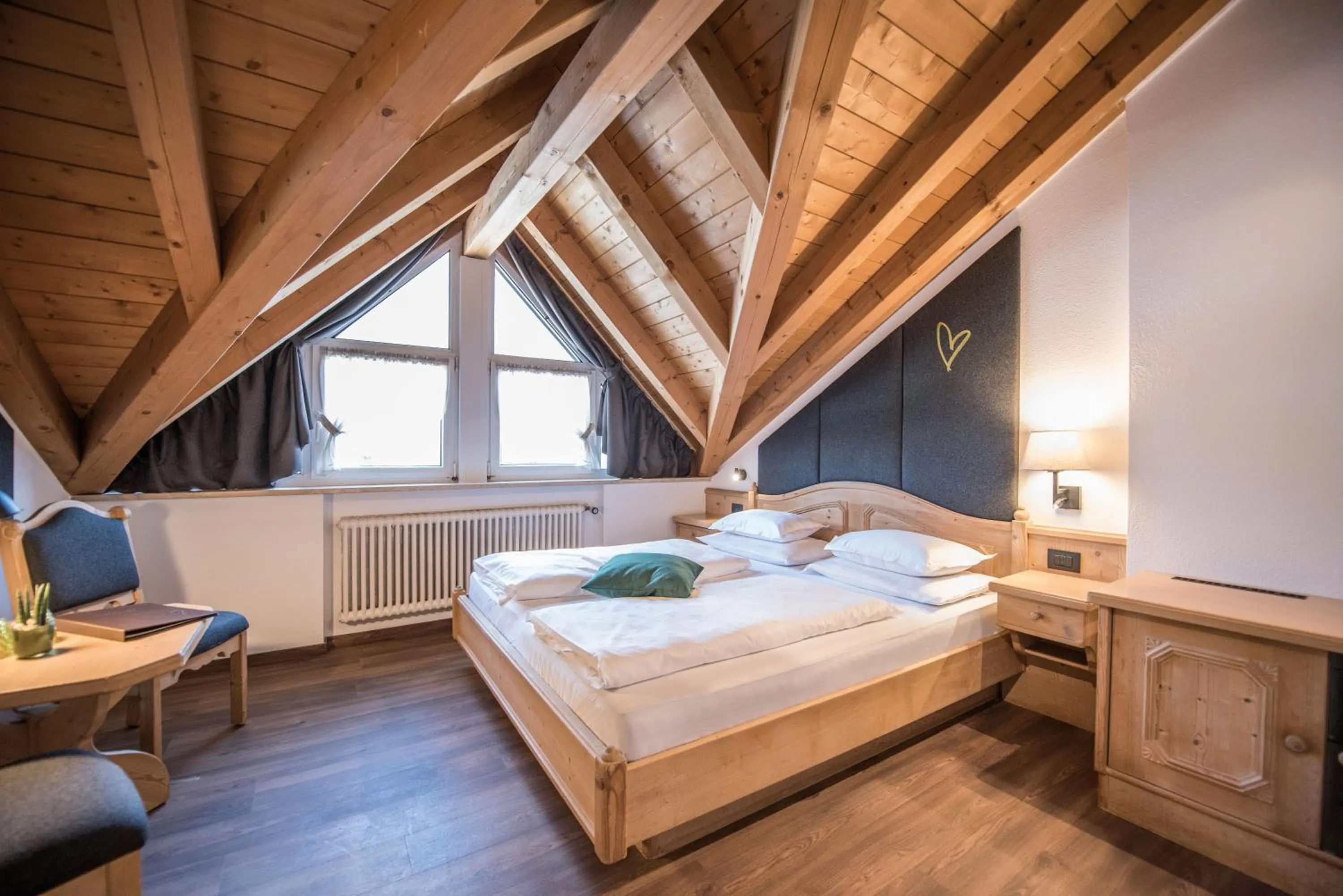 Bed in Vitaurina Royal Hotel