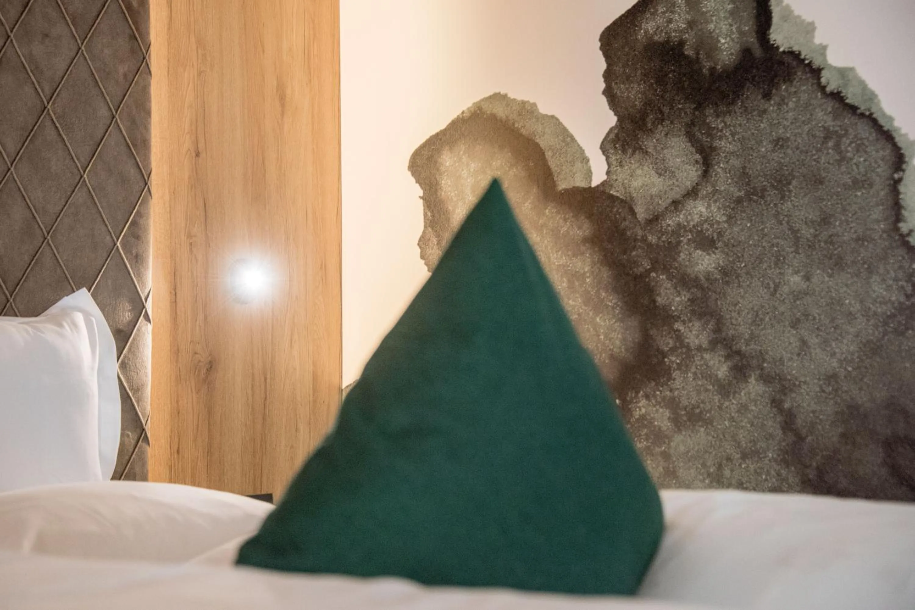 Bed in Vitaurina Royal Hotel