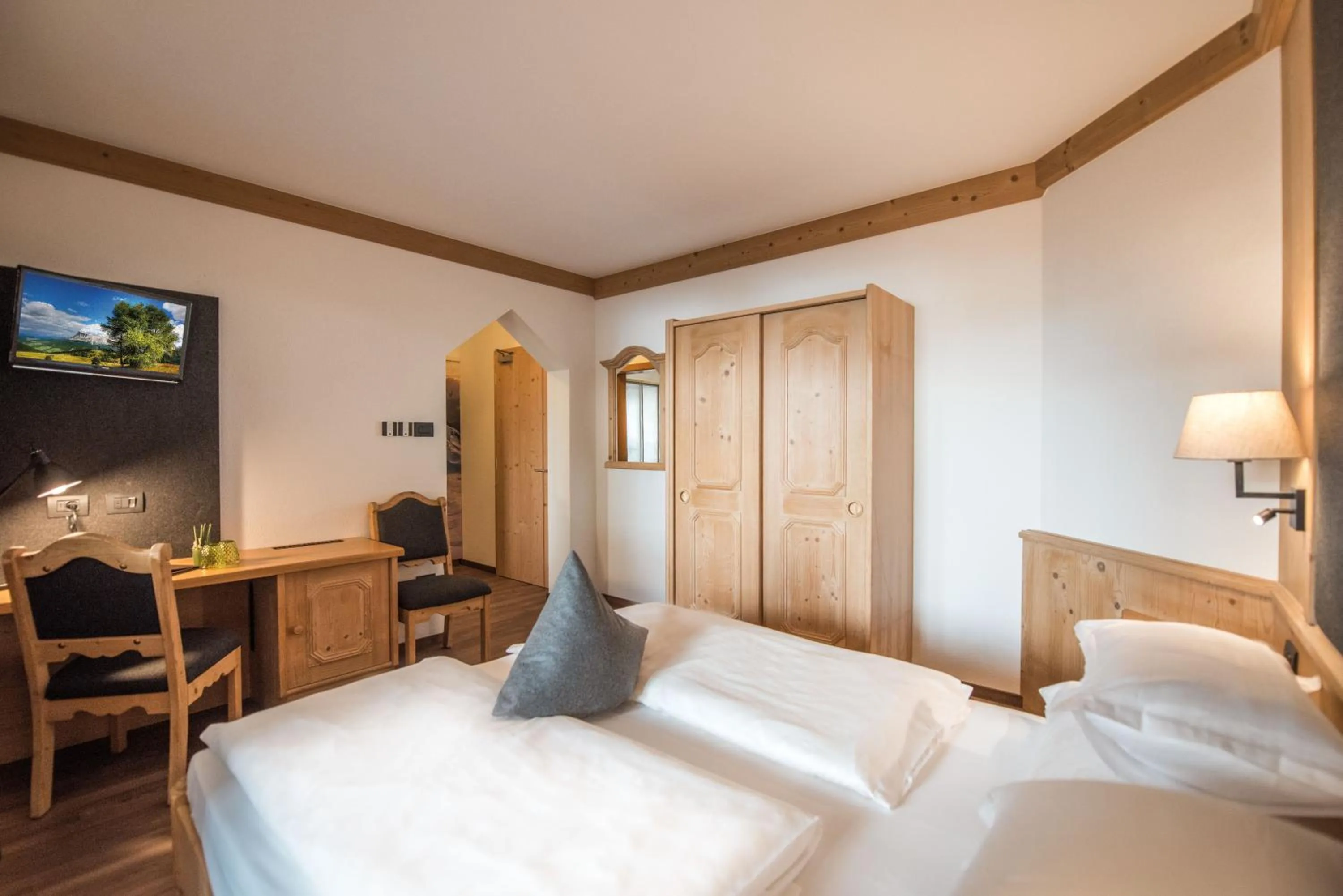 Bed in Vitaurina Royal Hotel