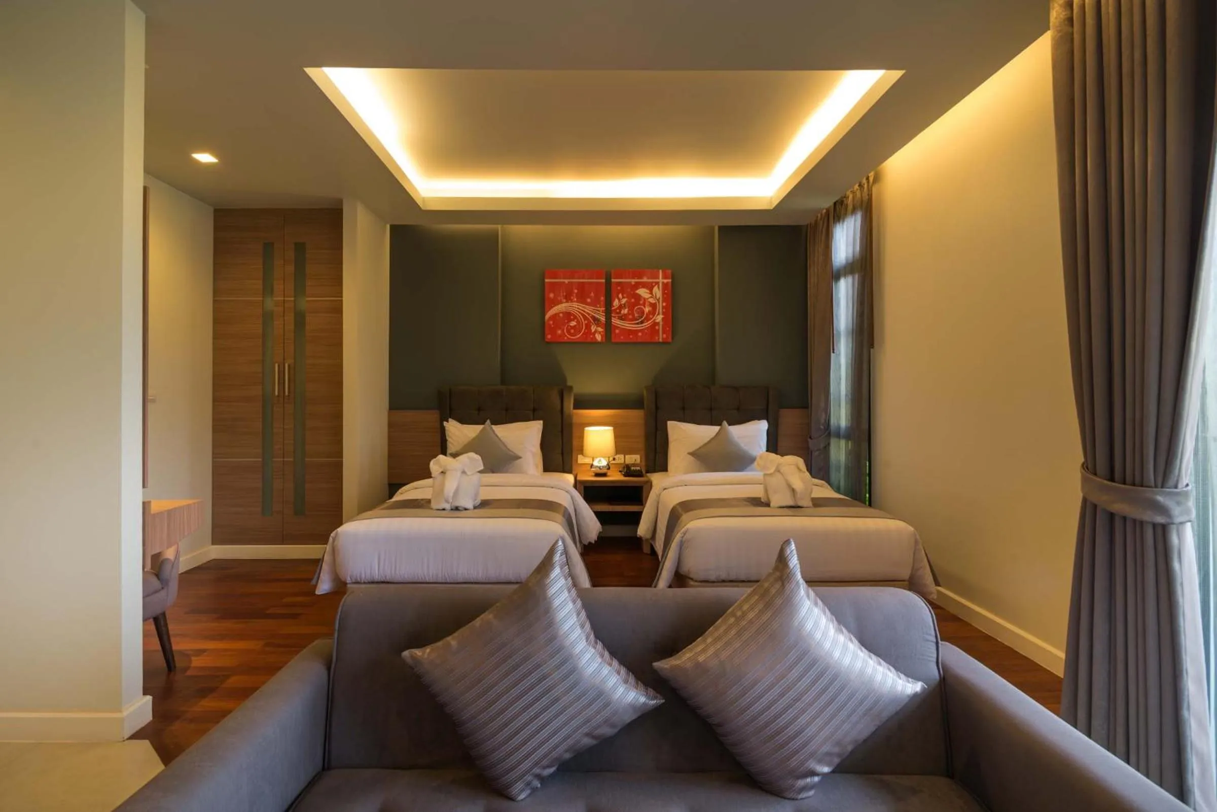 Photo of the whole room, Bed in Green Ville Laguna Hotel