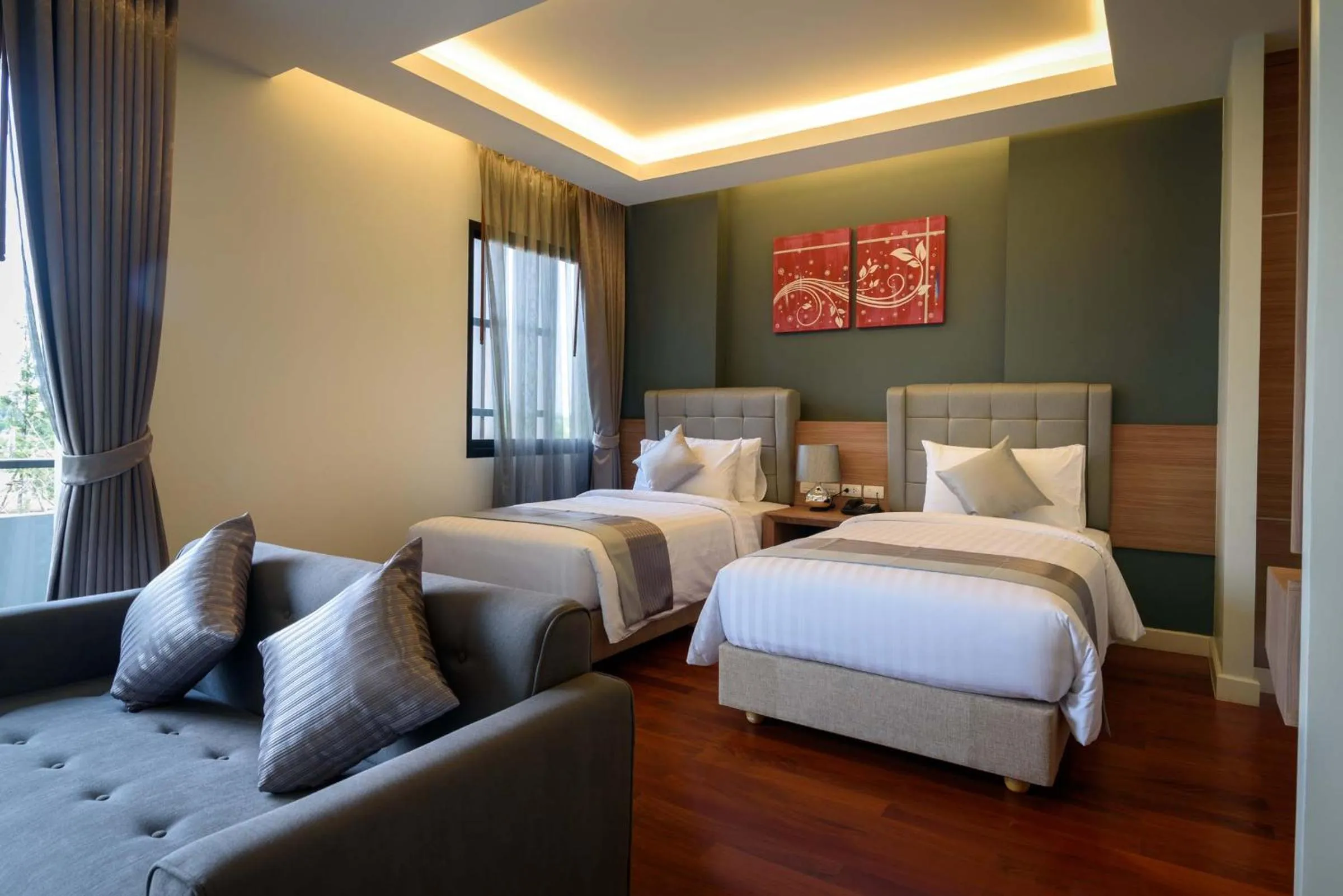 Bed in Green Ville Laguna Hotel