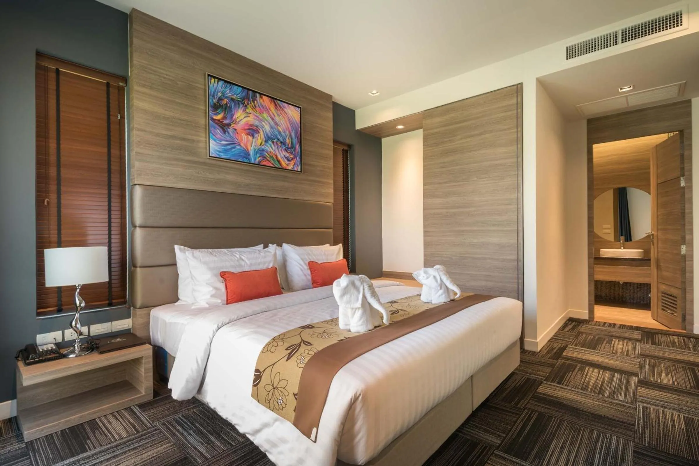 Bed in Green Ville Laguna Hotel