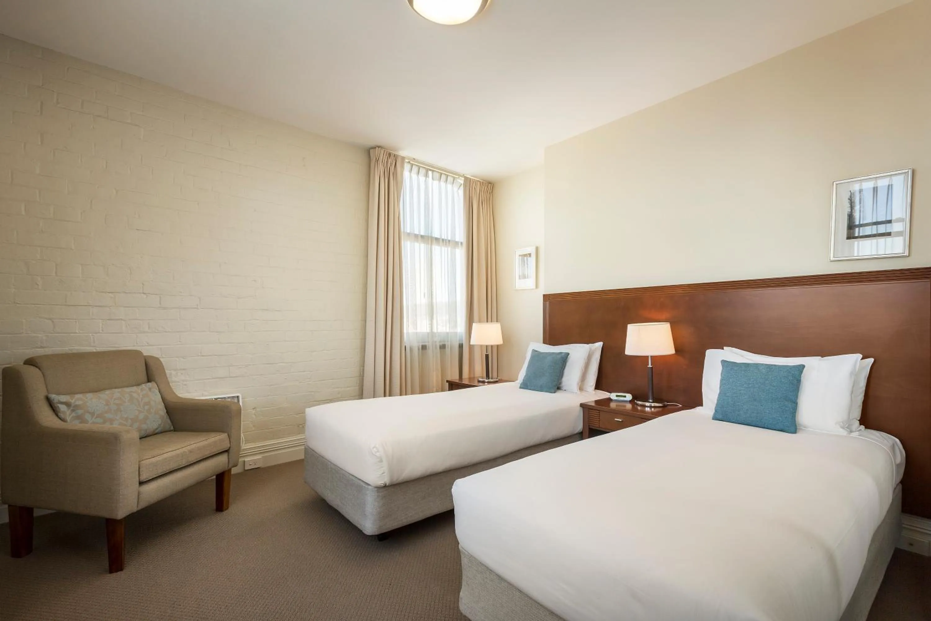 Bed in Launceston Central Apartment Hotel Official