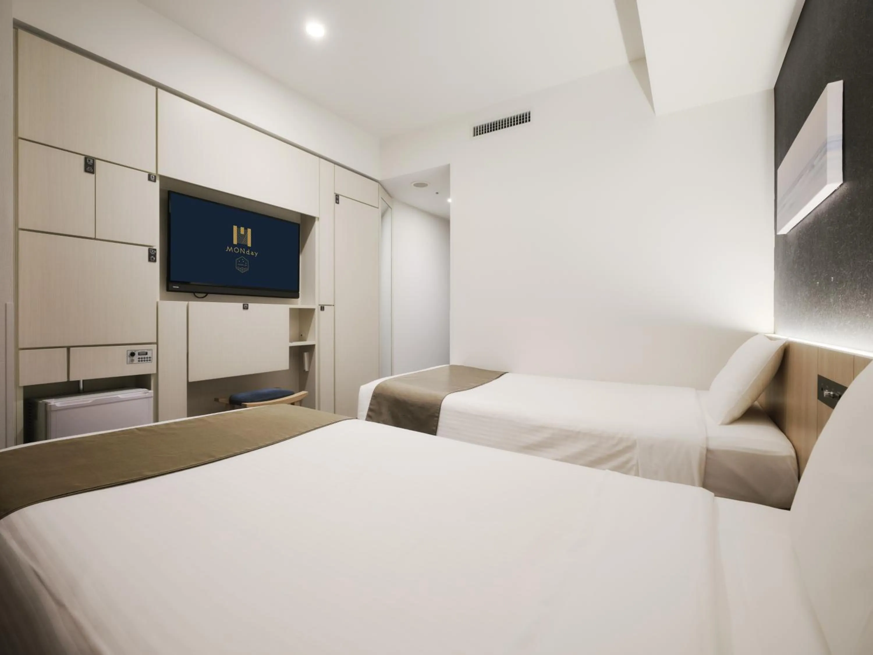 Photo of the whole room, Bed in hotel MONday Premium TOYOSU