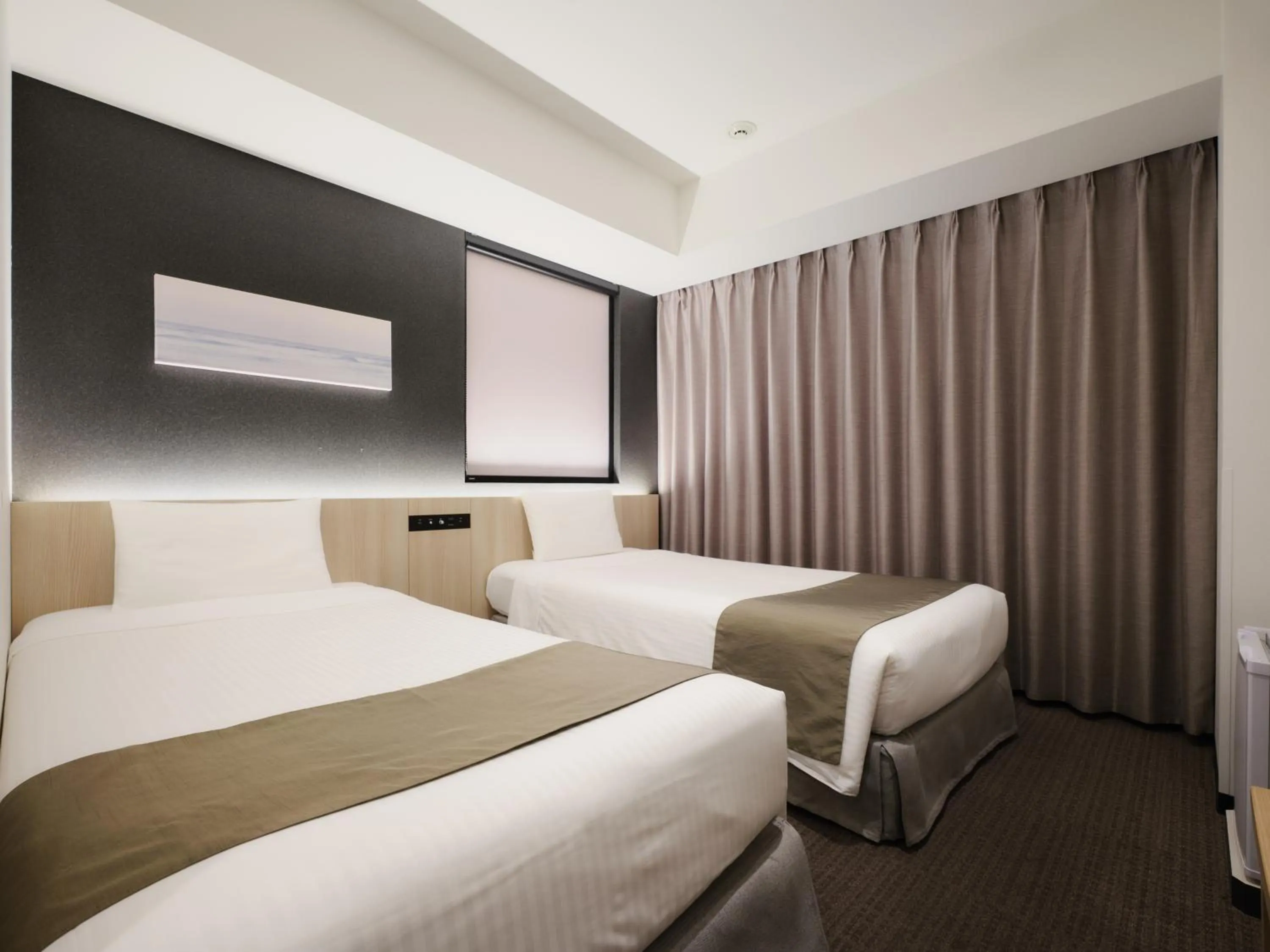 Bed in hotel MONday Premium TOYOSU