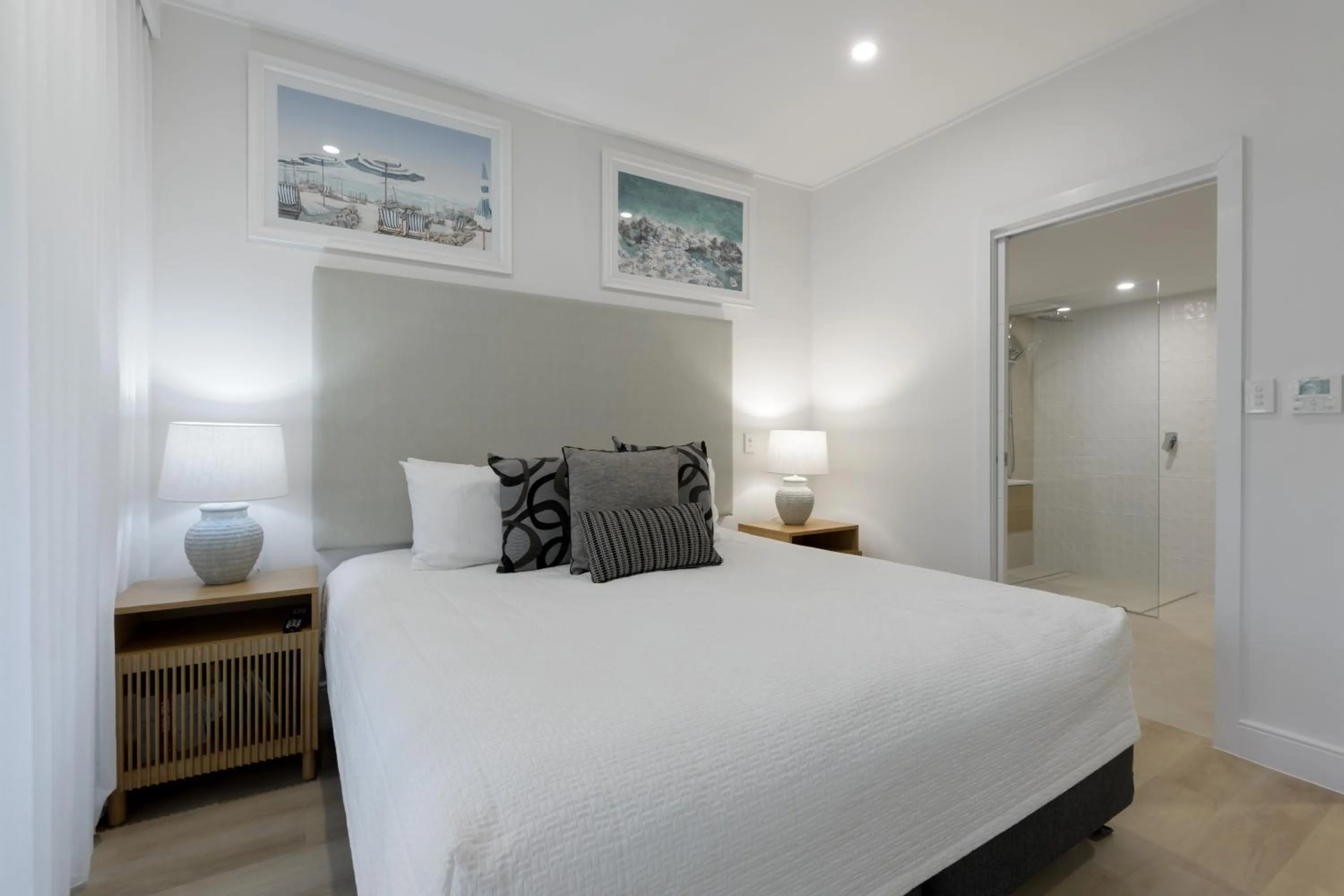 Bed in Mandalay Luxury Beachfront Apartments