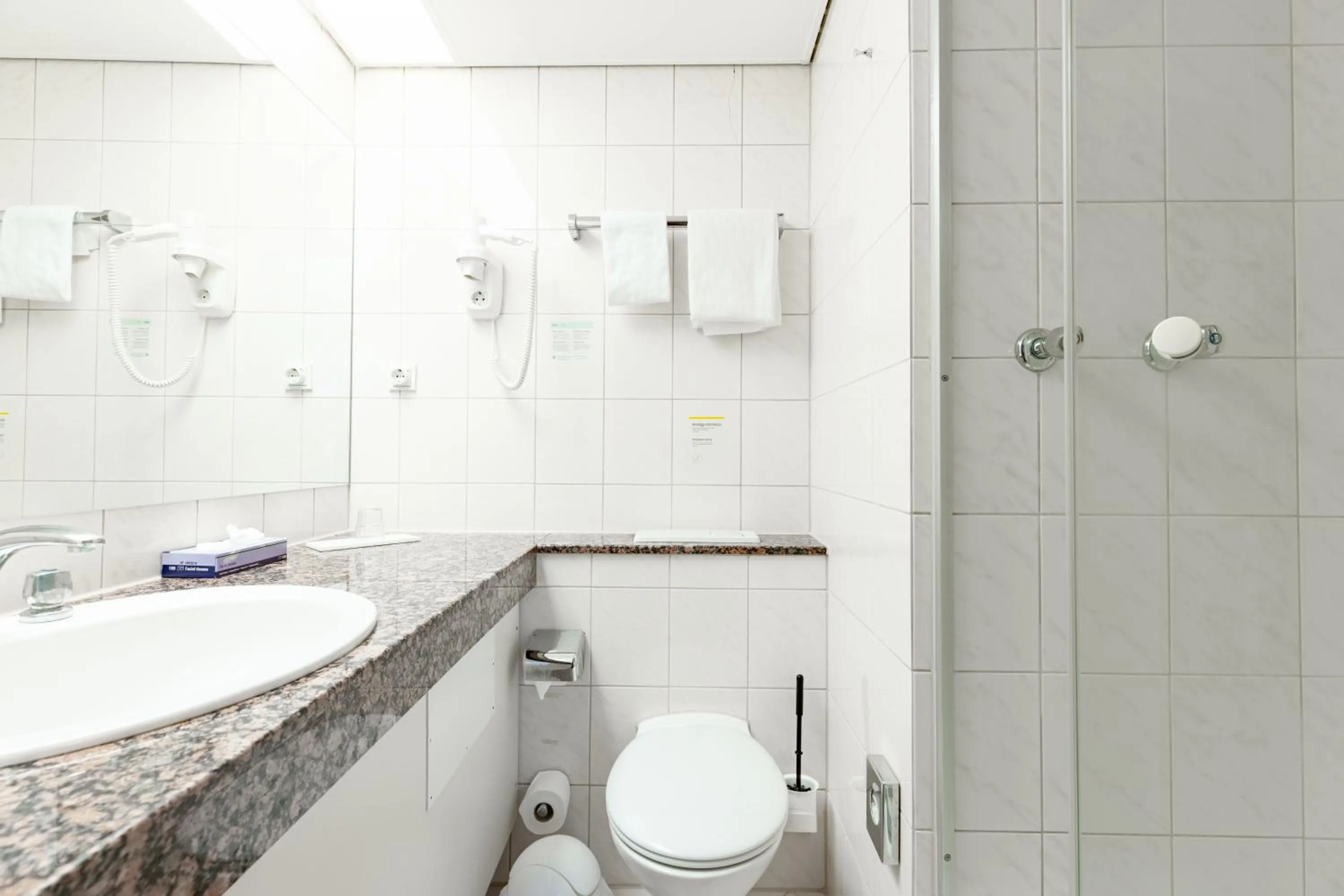 Shower in Garner Hotel Dusseldorf - Main Station by IHG