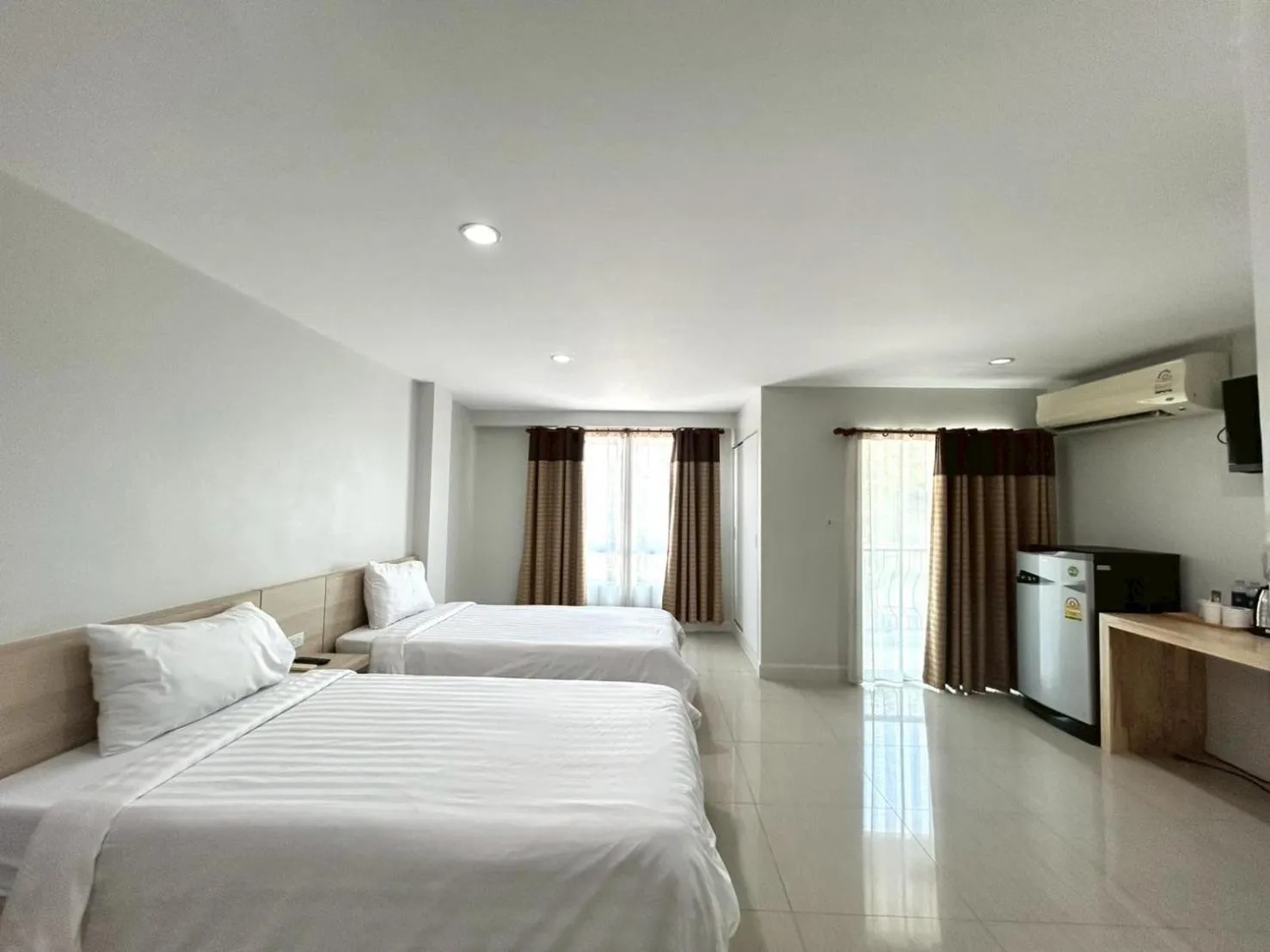 Bed in DD Boutique Resort