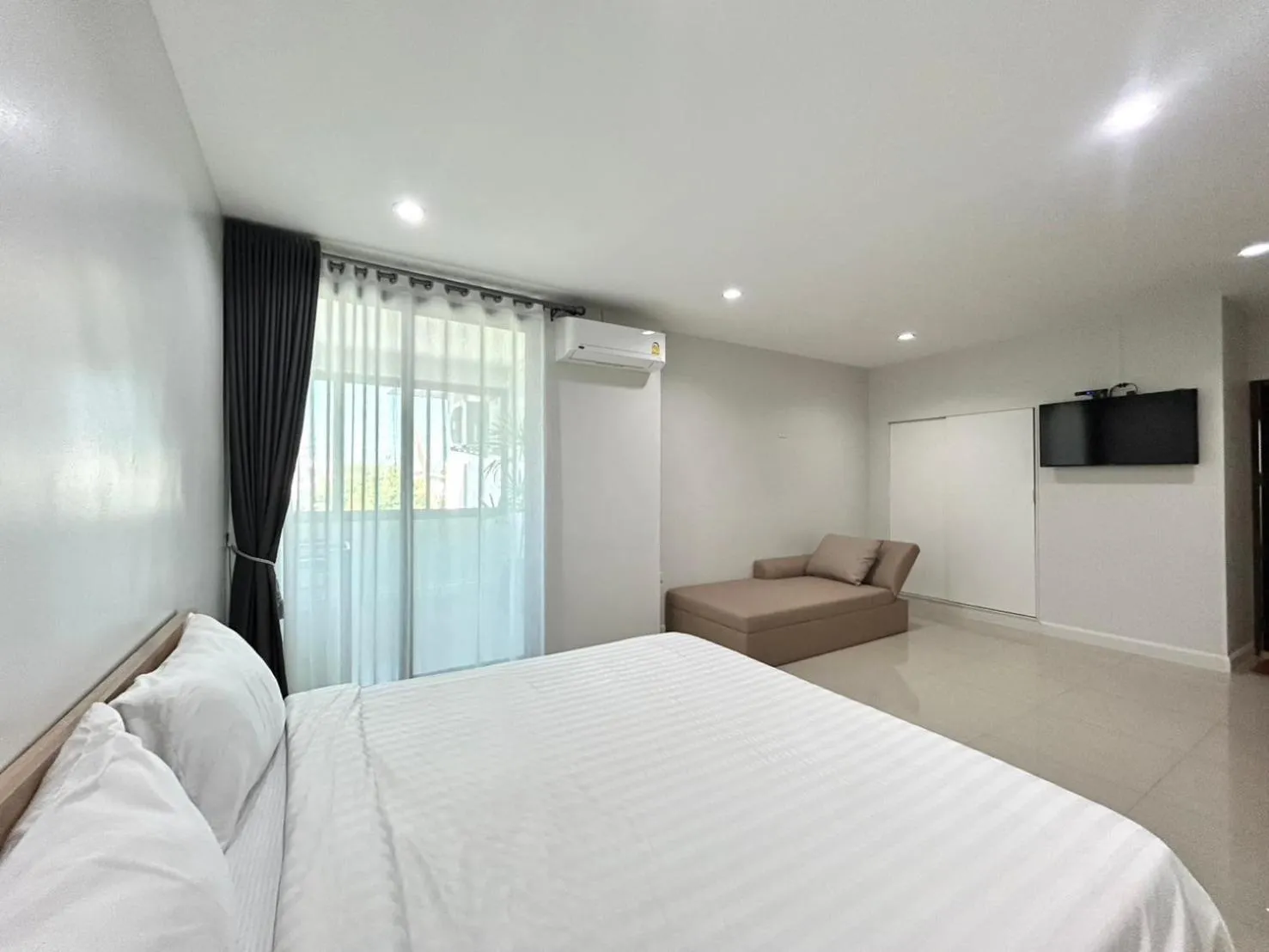 Bed in DD Boutique Resort