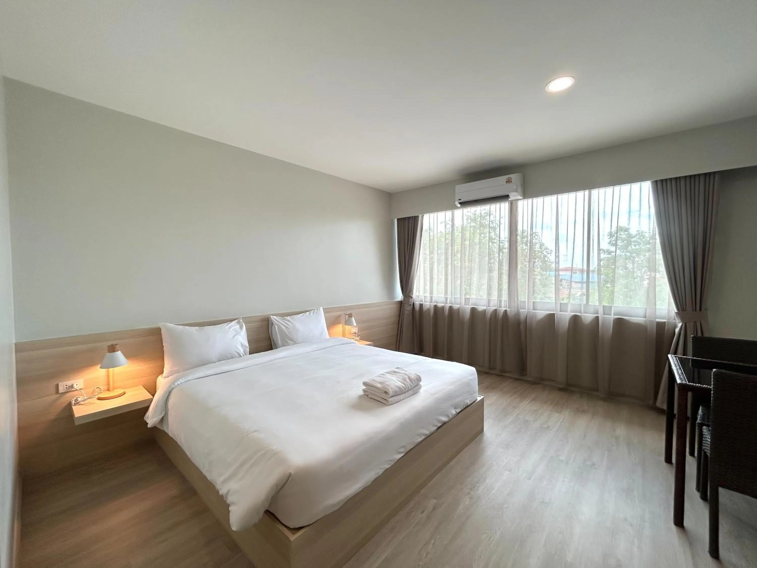 Bed in DD Boutique Resort